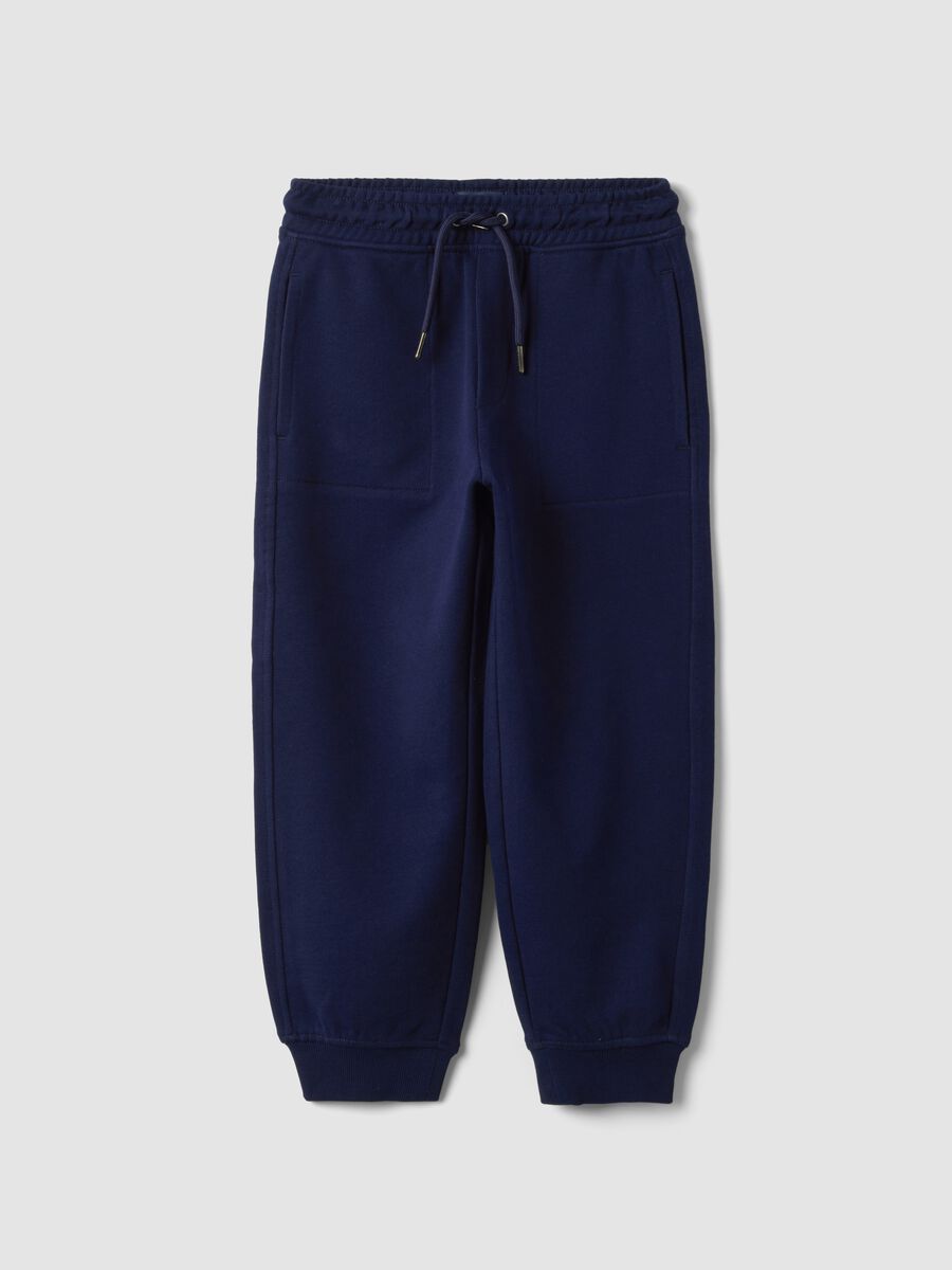 Pantaloni jogger blu in puro cotone con vita elasticizzata per bambino_0