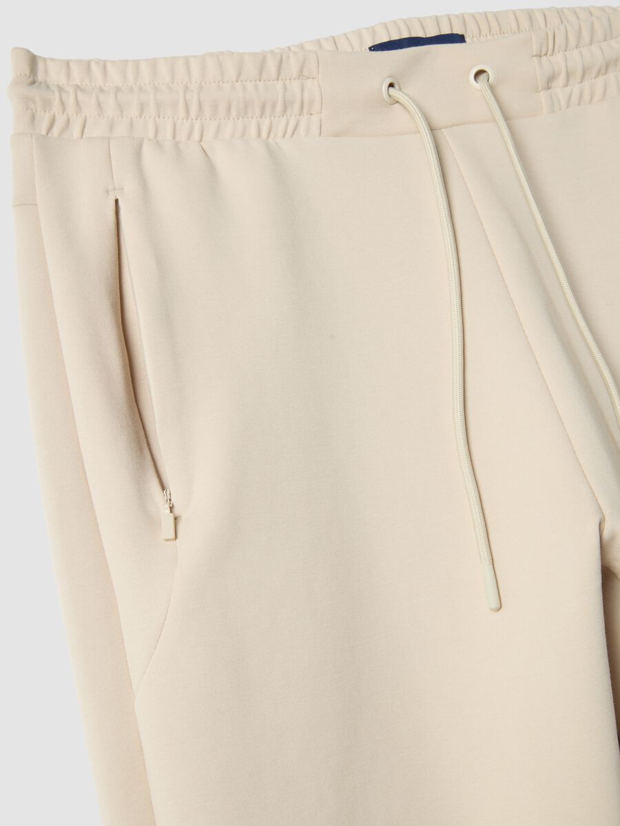 Pantaloni jogger in misto cotone elasticizzato beige regular fit_1
