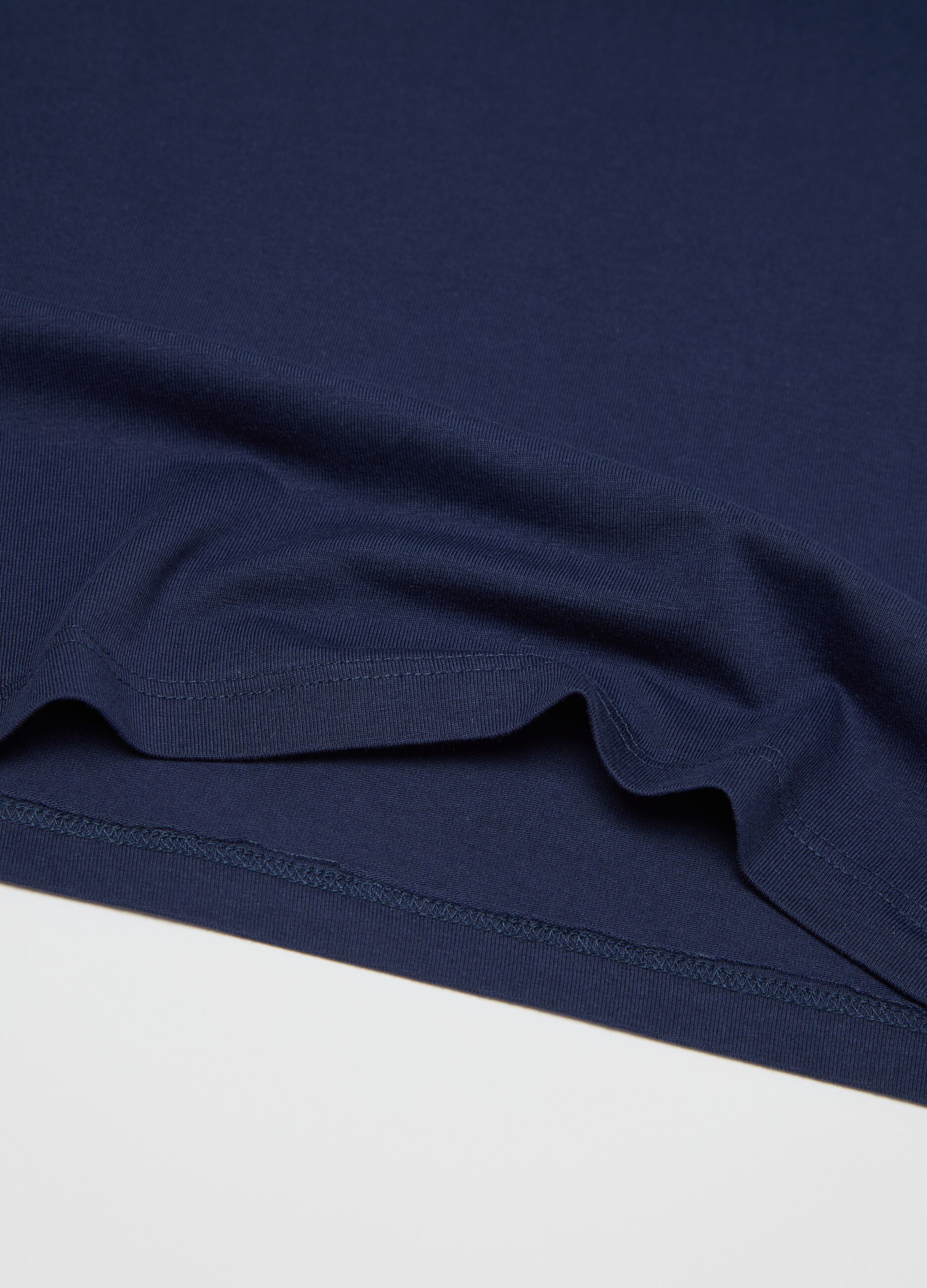 Two-pack blue and white racerback vests in organic cotton