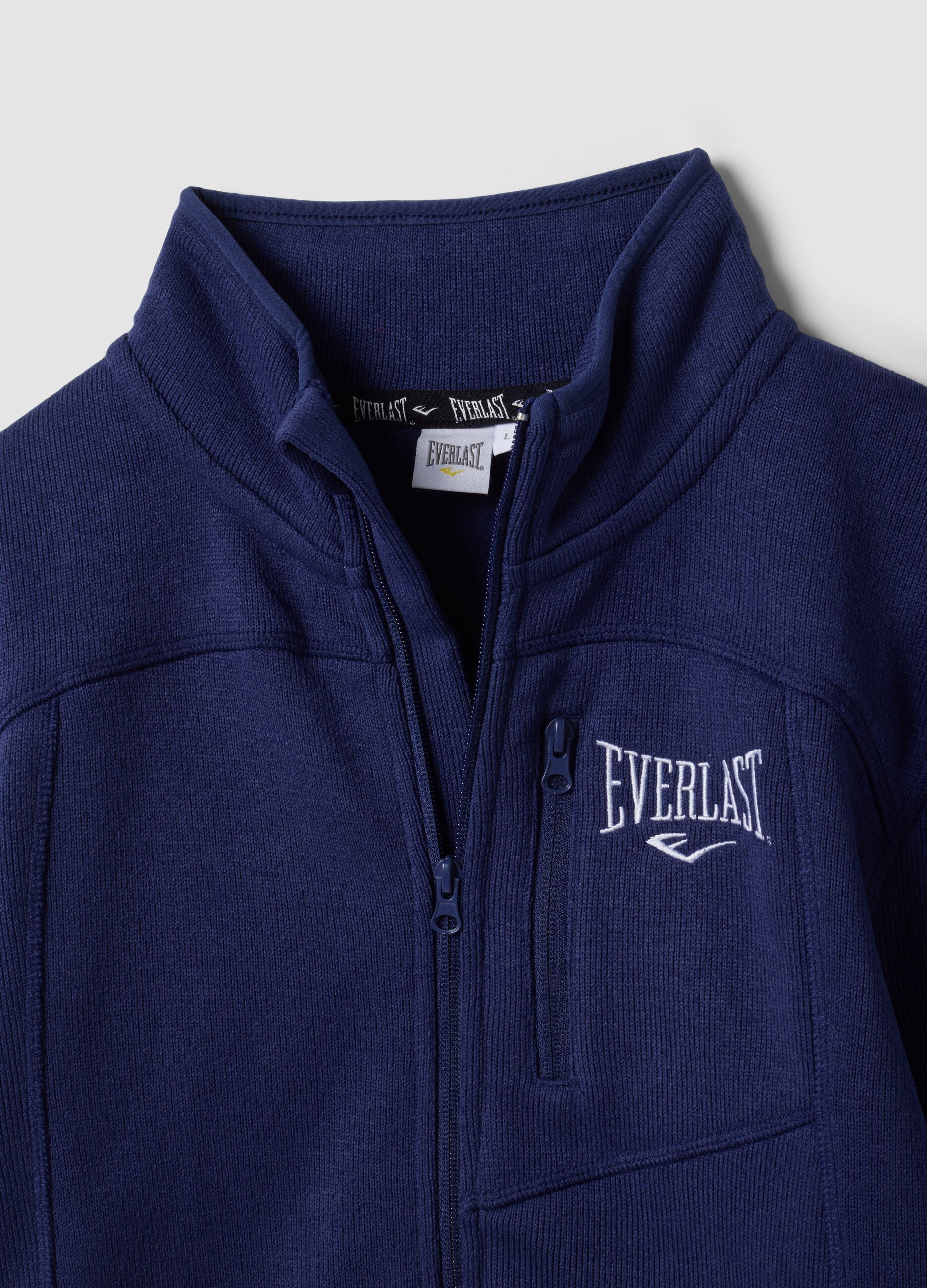 Blue full-zip sweatshirt with high neck and logo