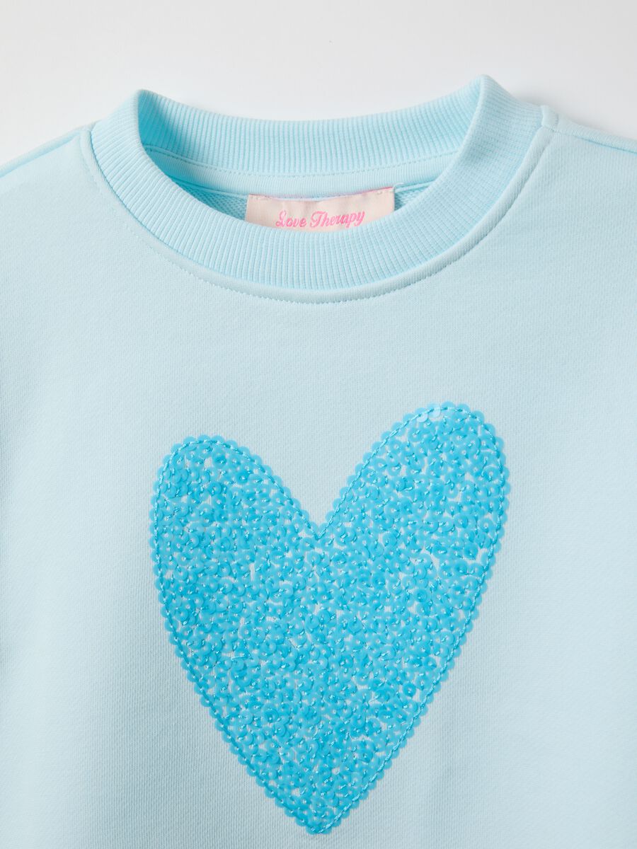 Sky blue cotton blend regular fit sweatshirt with heart for girls_2