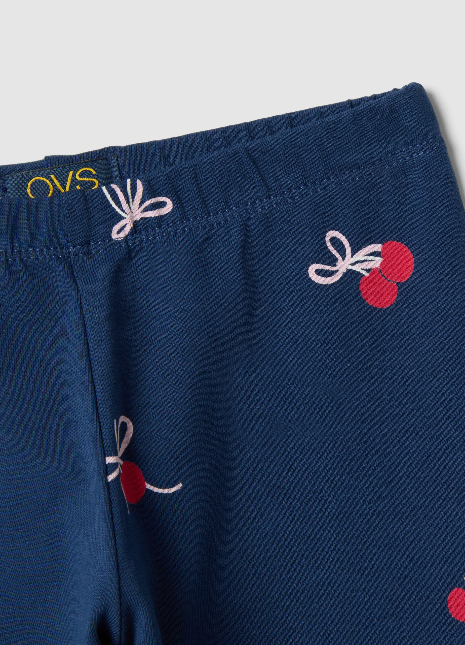 Girl's slim-fit blue stretch cotton leggings with patterns