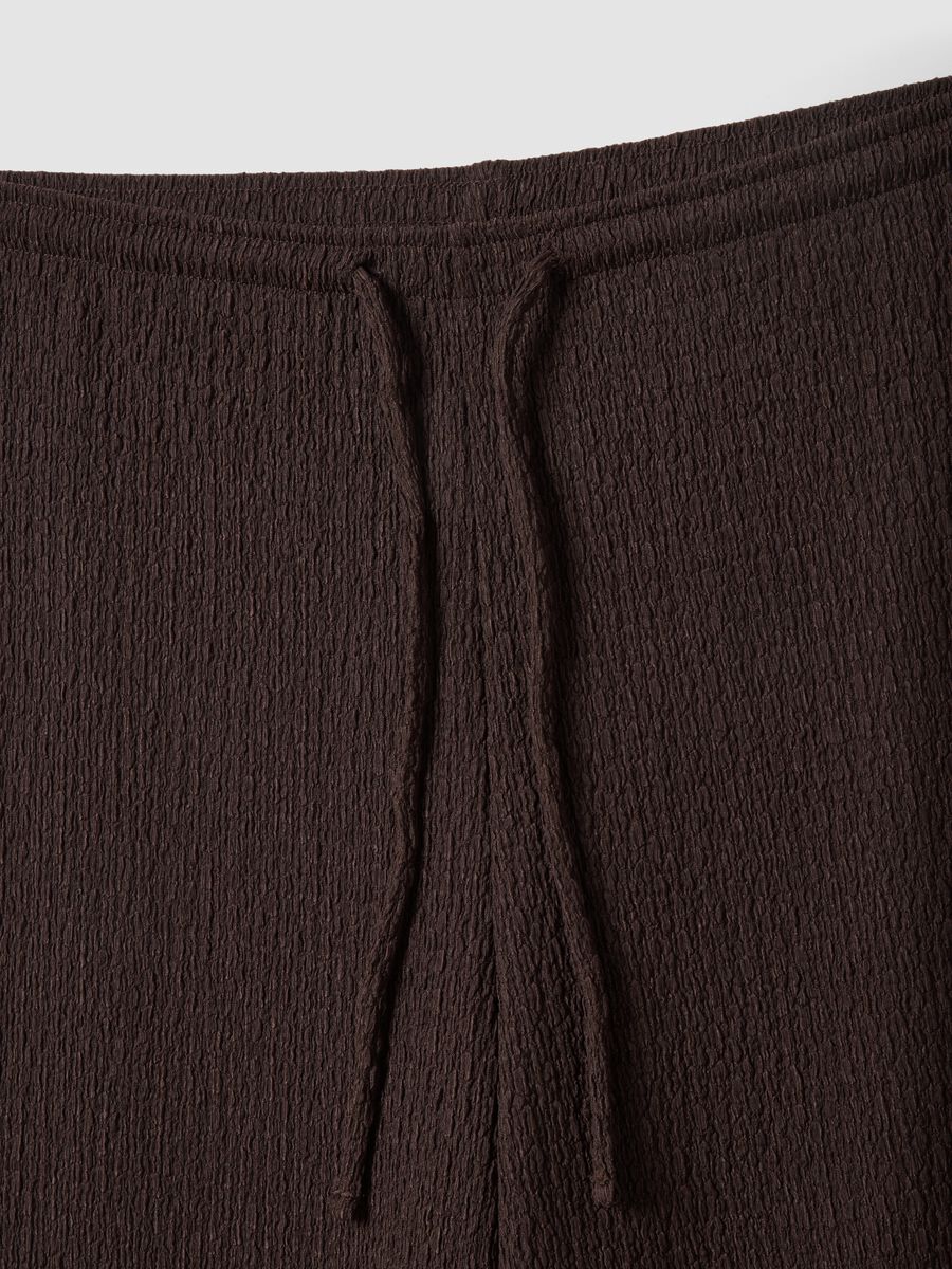 Brown stretch wide-leg trousers with crinkled texture_1