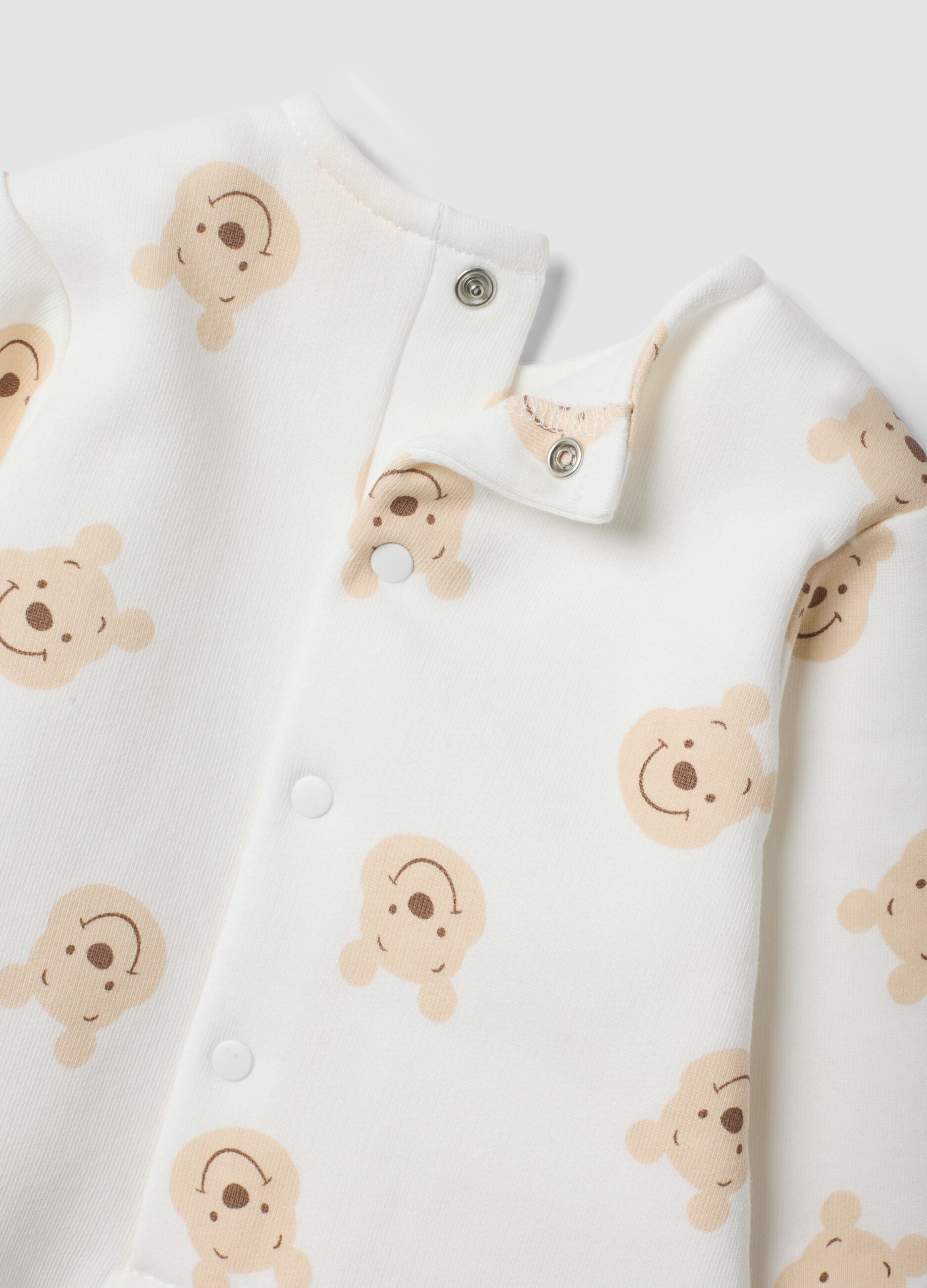 White organic cotton sleepsuit with Winnie the Pooh print