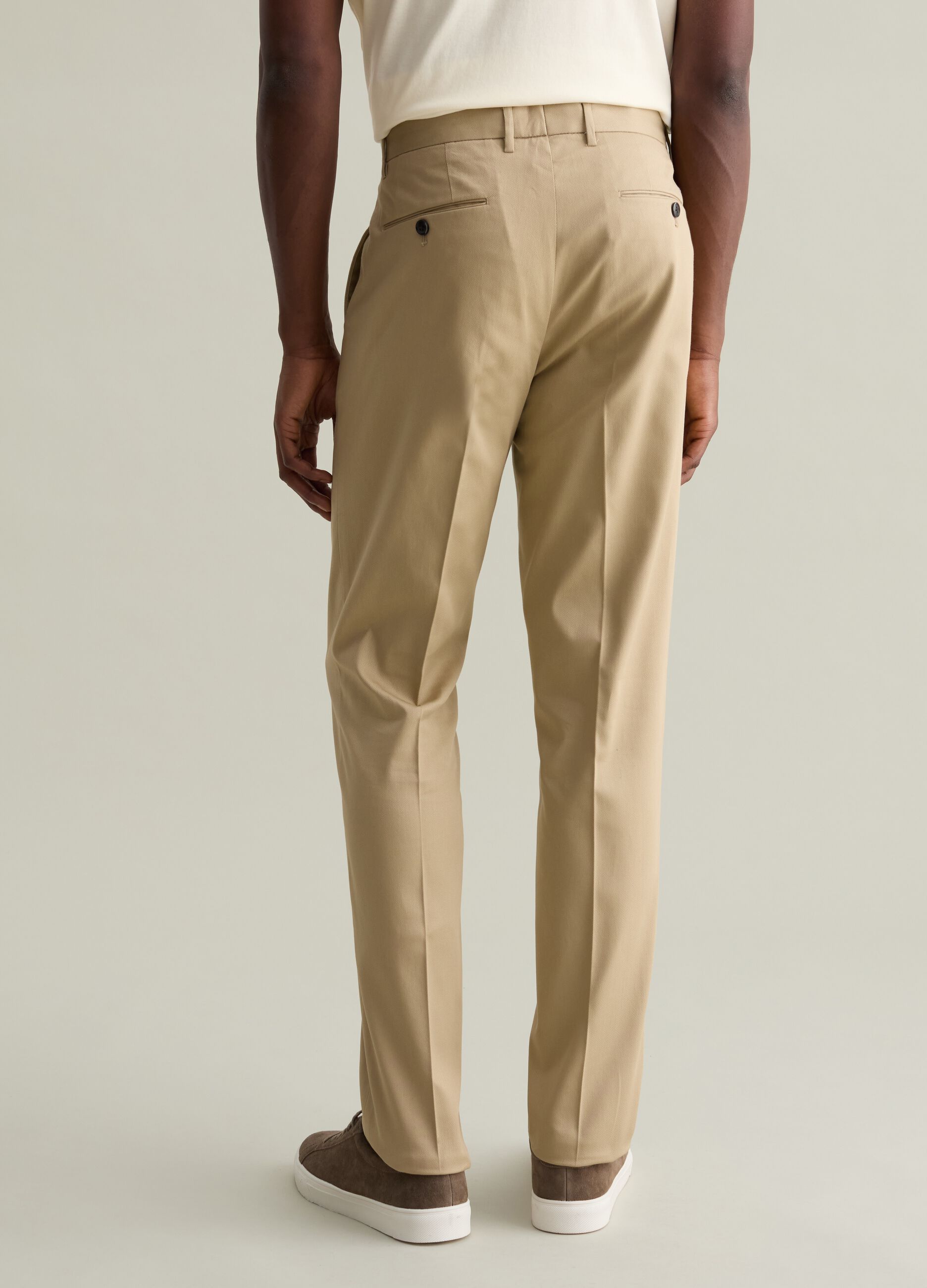 Contemporary chino trousers with darts