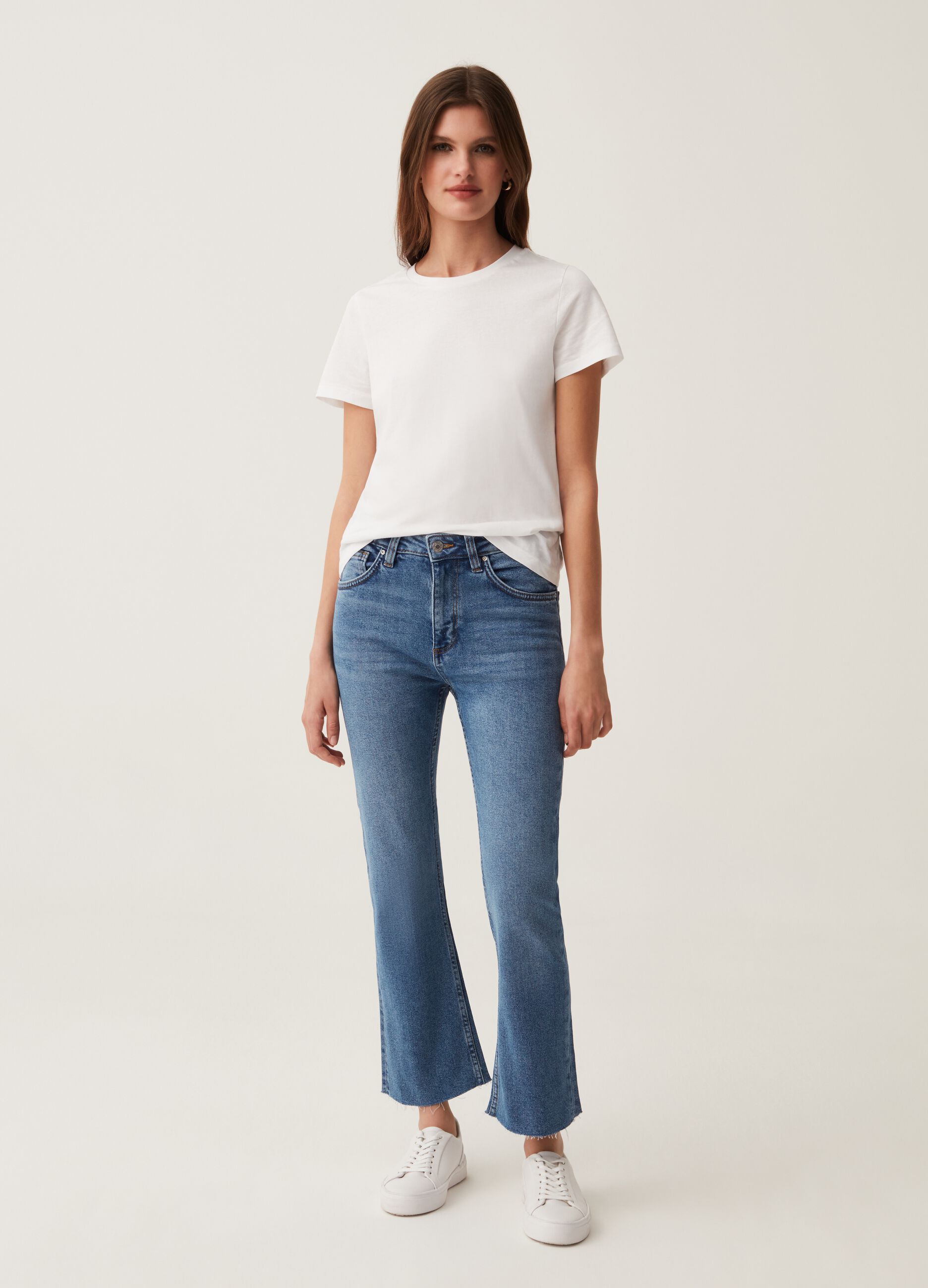 Flare-fit jeans with raw edging