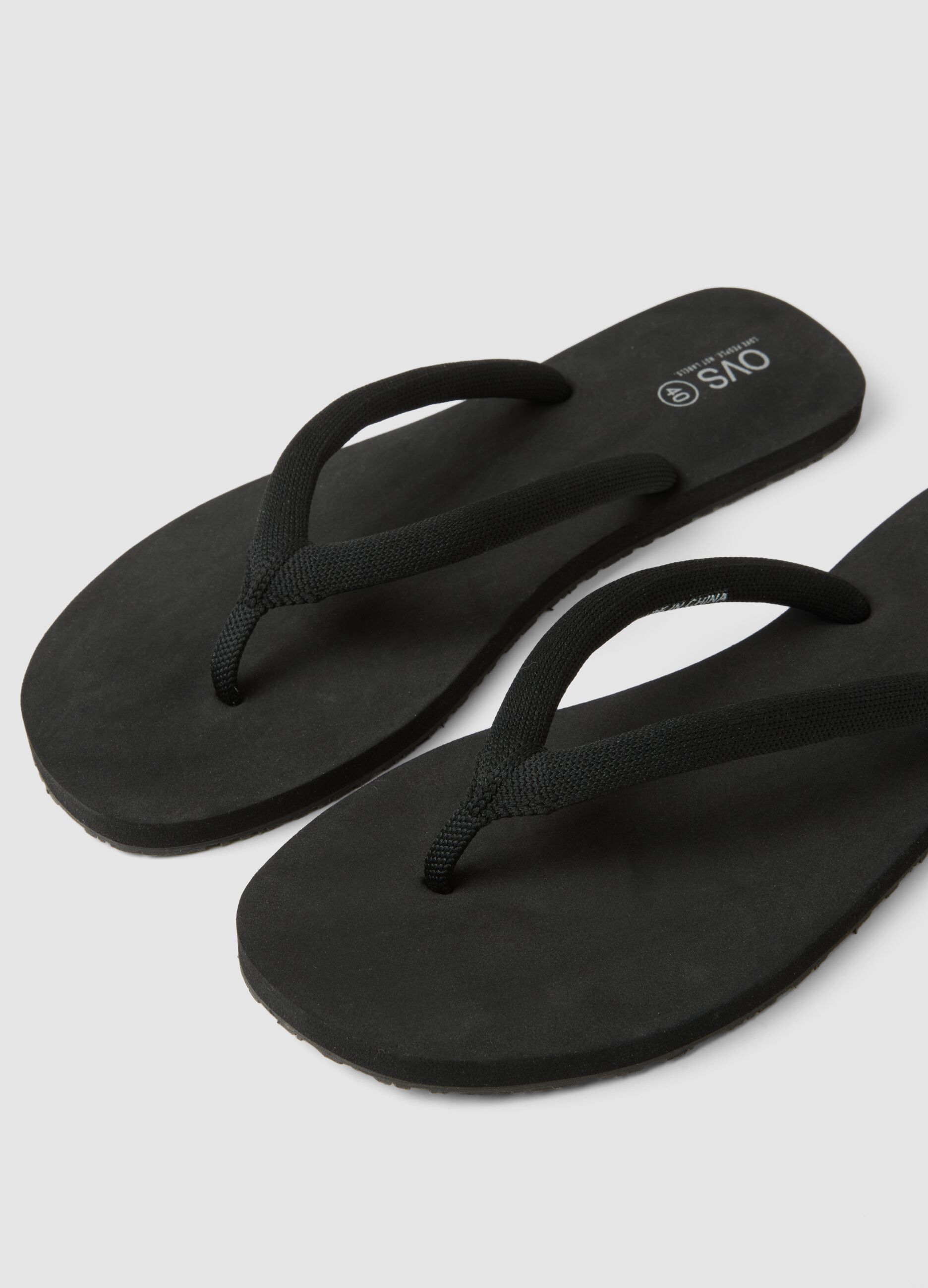 Black flip-flops with chunky straps