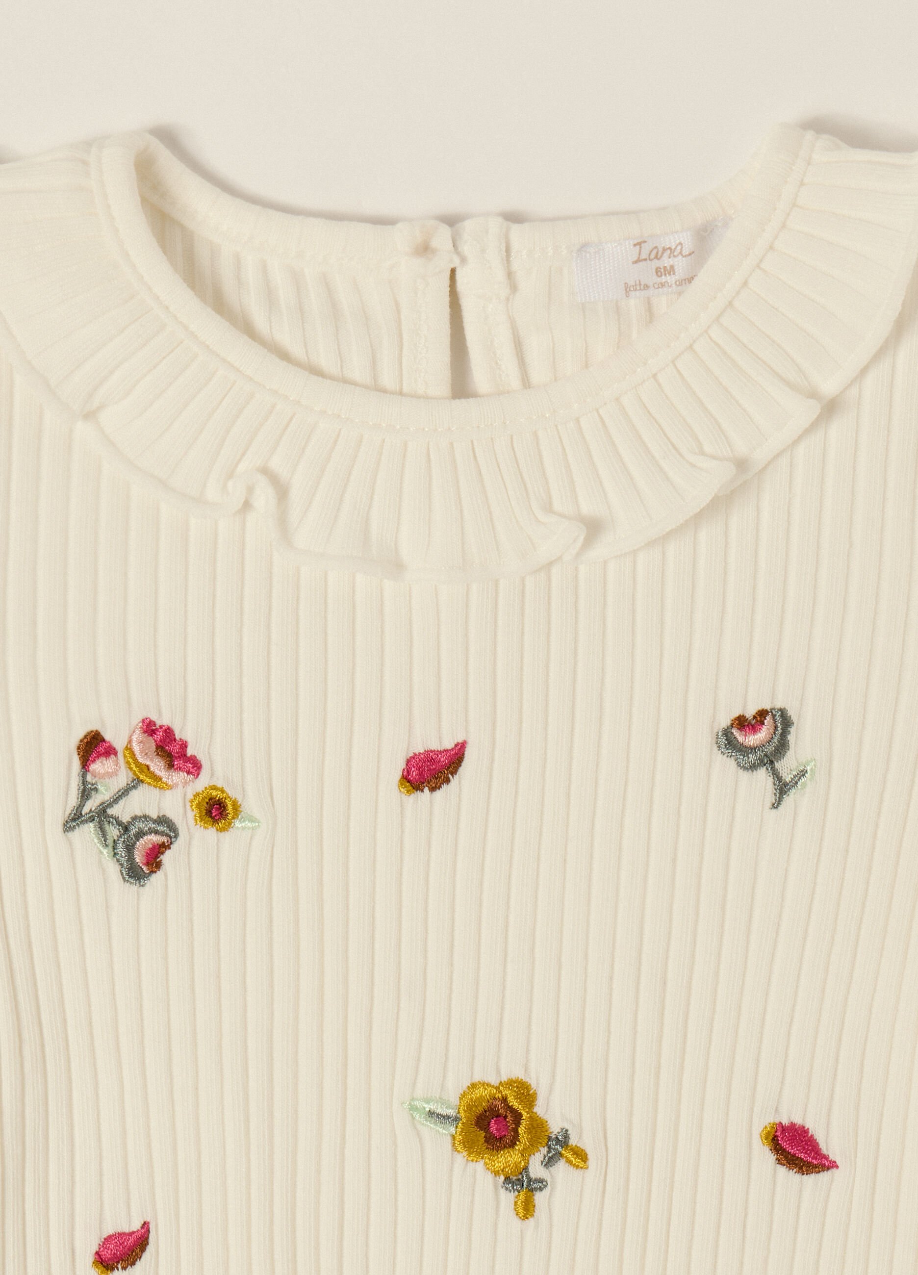 White long sleeve top with embroidery