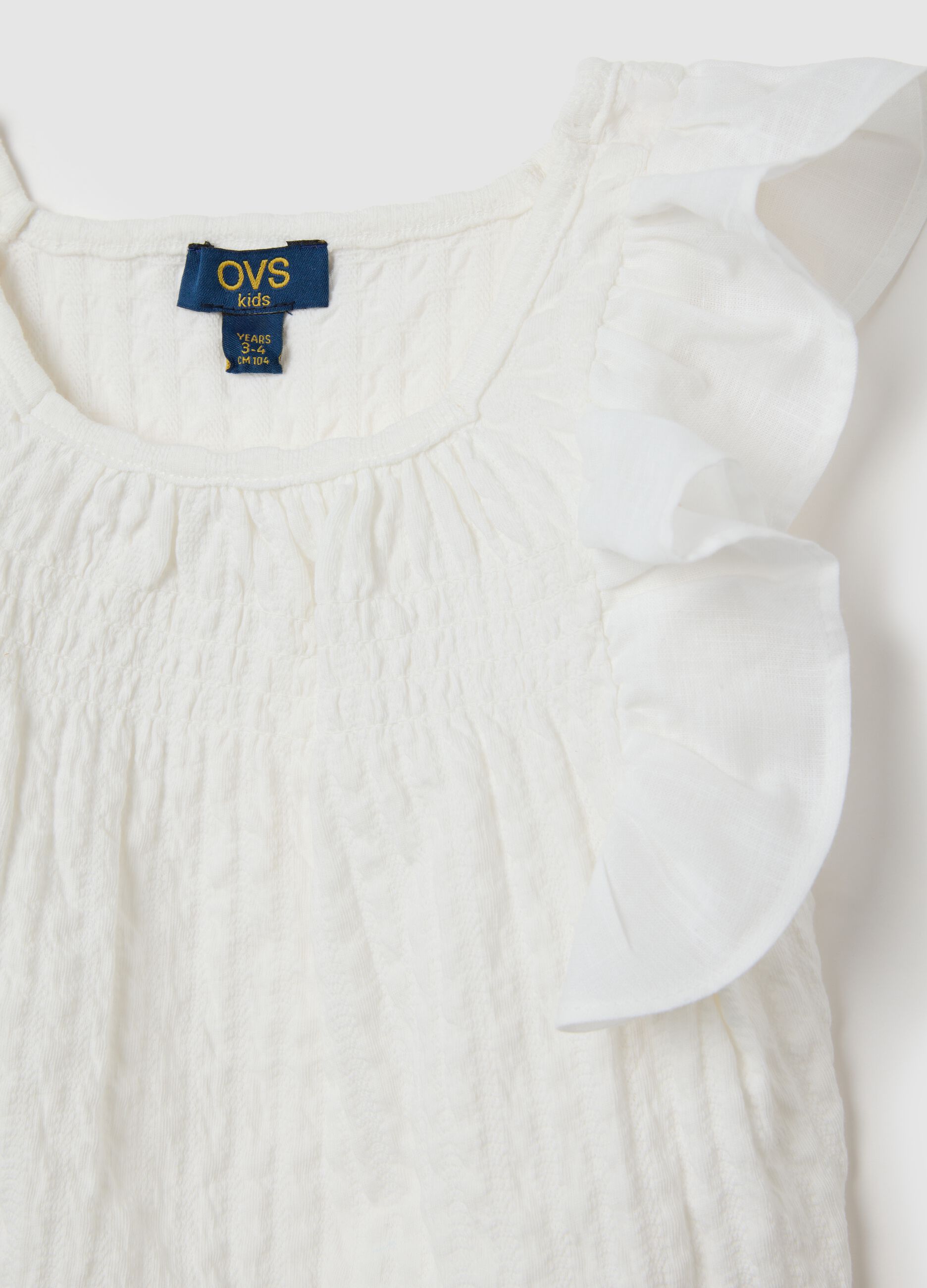 Set da bambina in cotone elasticizzato con top bianco e pantaloncini marroni regular fit