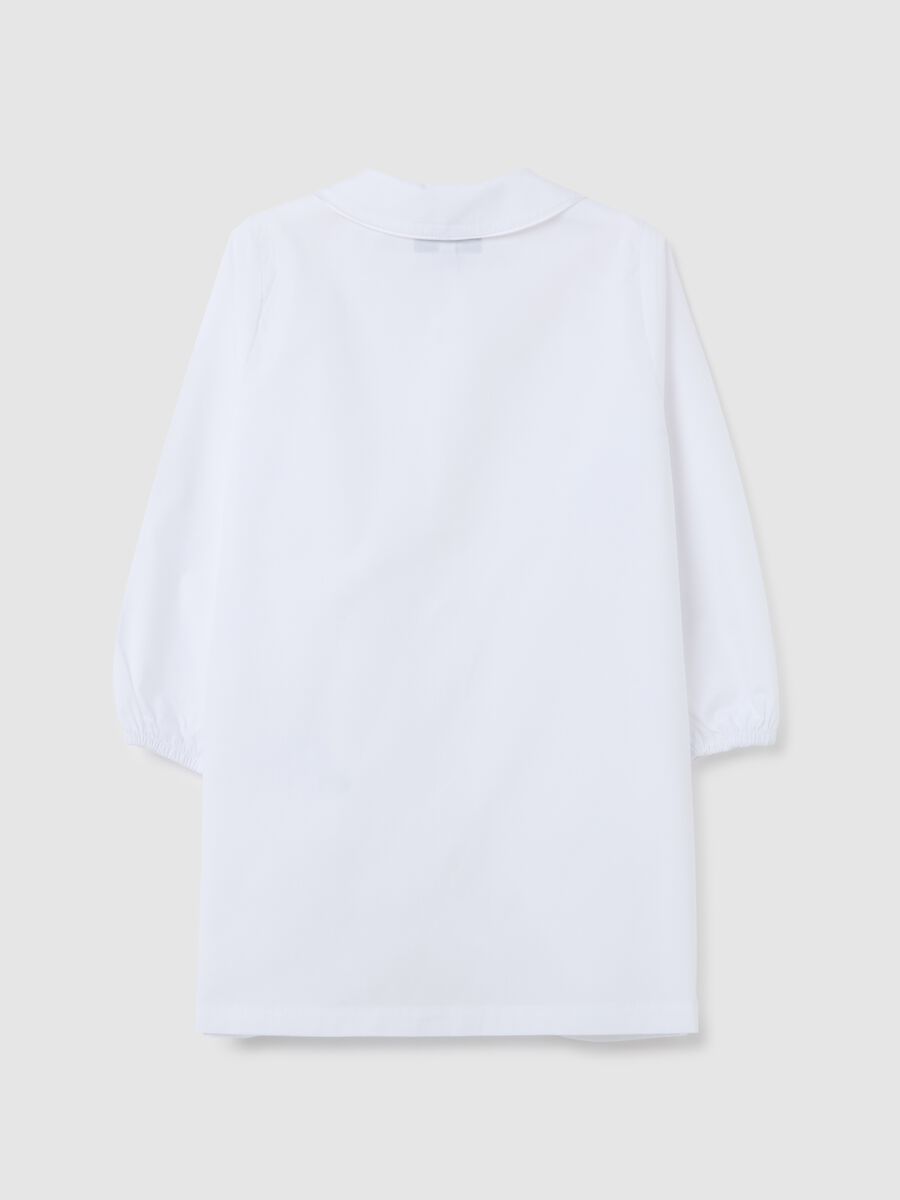 Girls' school smock in white cotton blend with unicorn_1