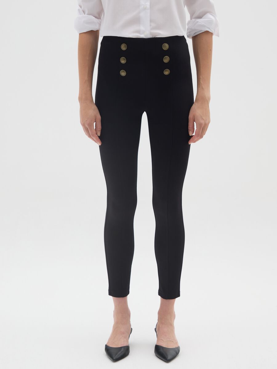 Leggings neri elasticizzati con bottoni decorativi_1