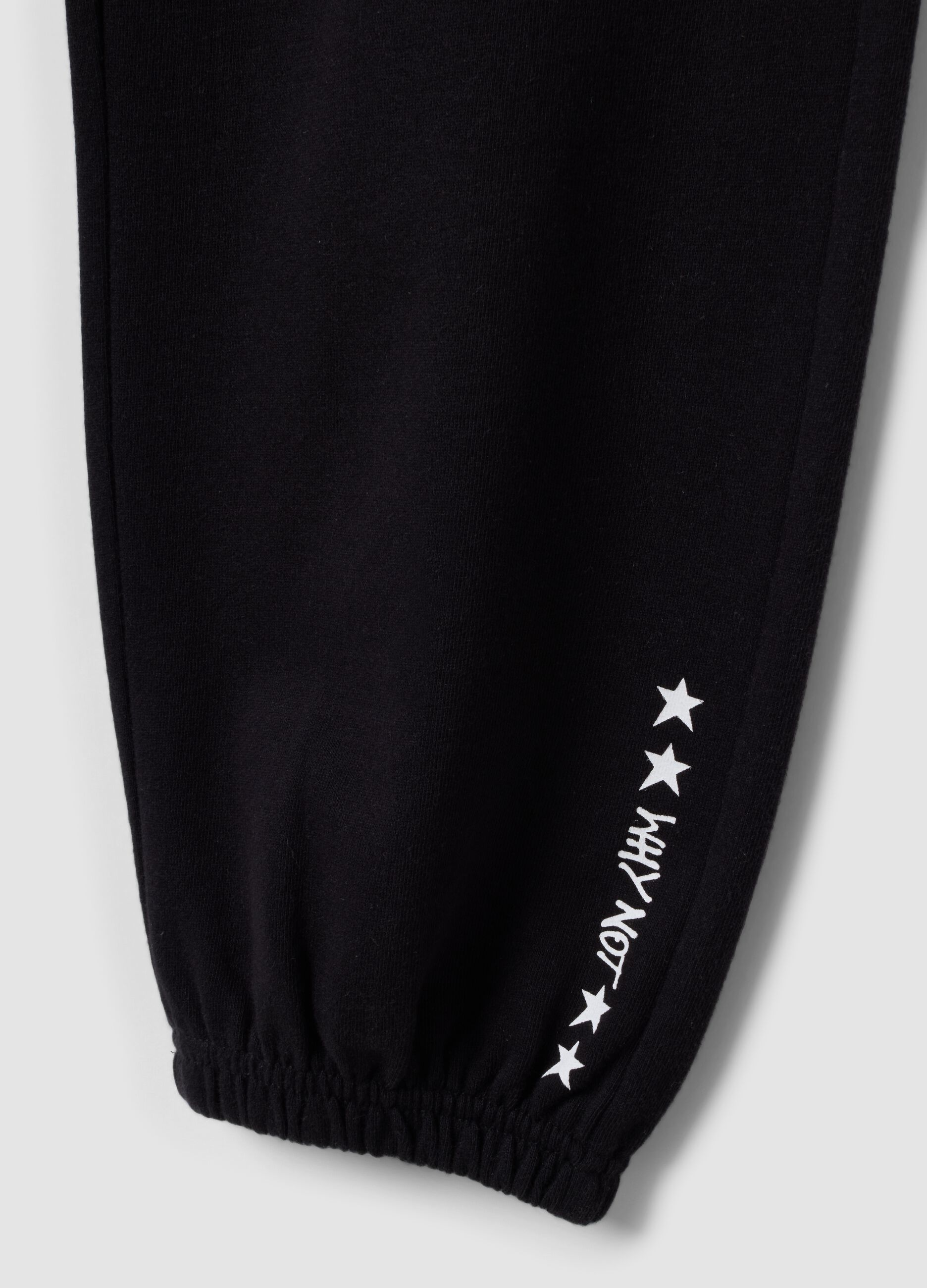 Black organic cotton-blend jogger trousers with printed detail for girls