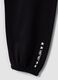 Black organic cotton-blend jogger trousers with printed detail for girls_5