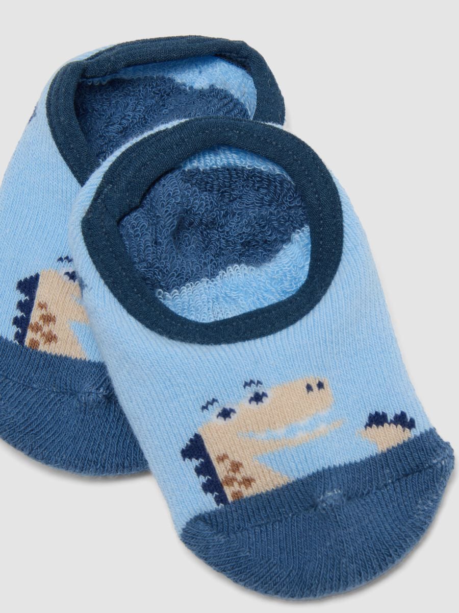Calze antiscivolo azzurre in cotone organico elasticizzato con dinosauro_2