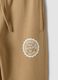 Beige cotton-viscose blend joggers with contrasting print for boys_3