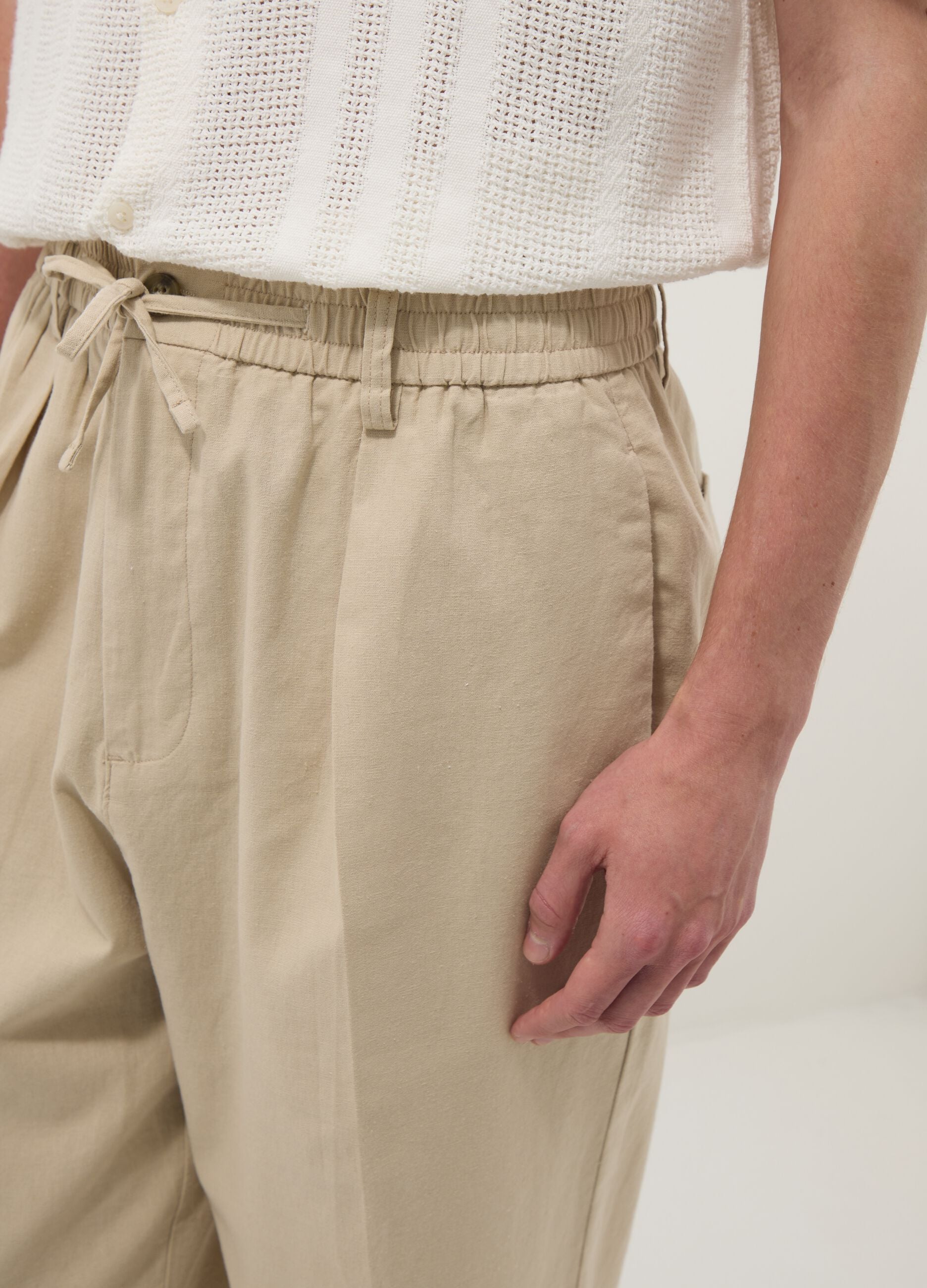Beige linen-cotton blend trousers with an elasticated waist