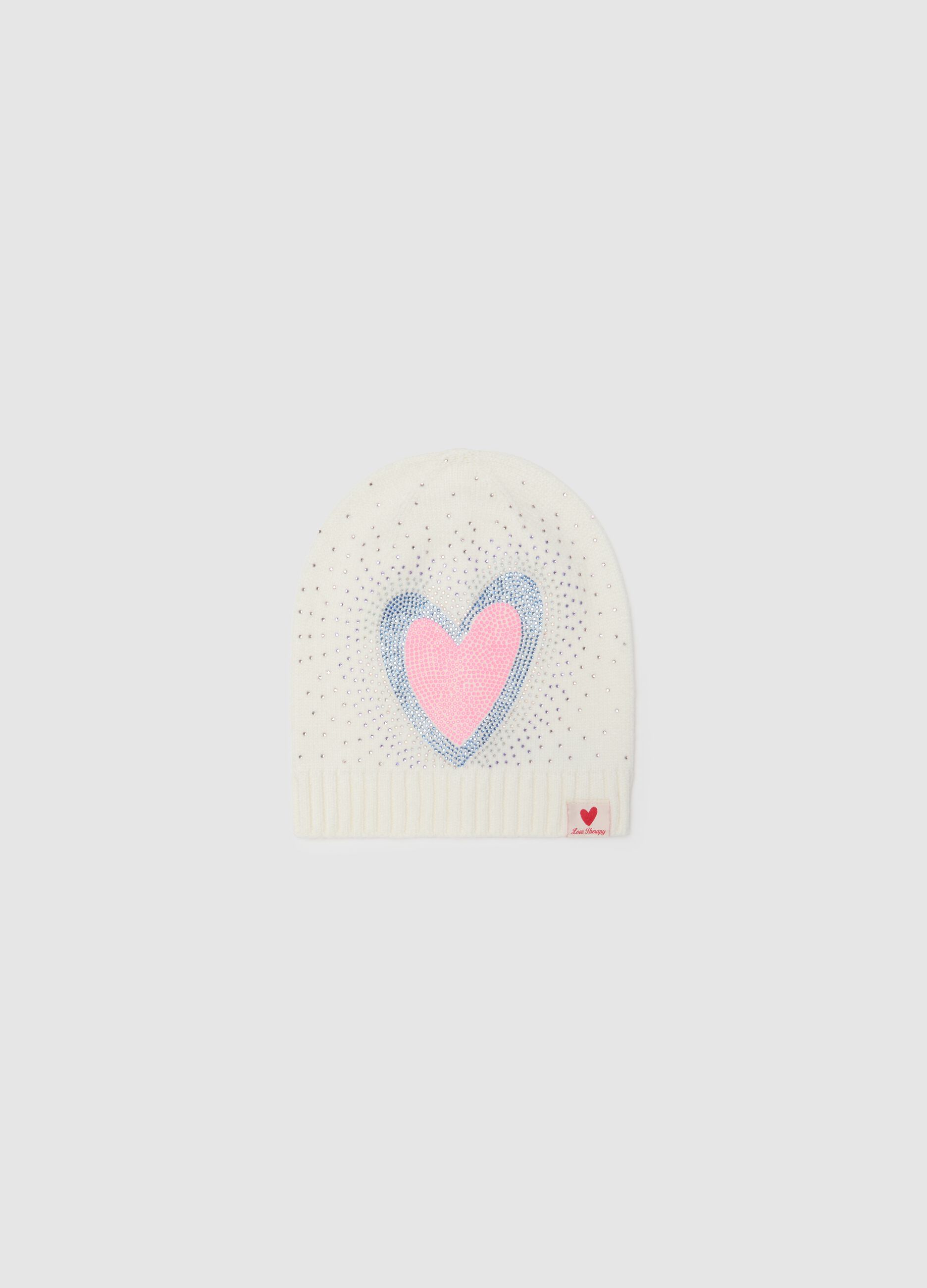 White girl's hat with rhinestone heart detail