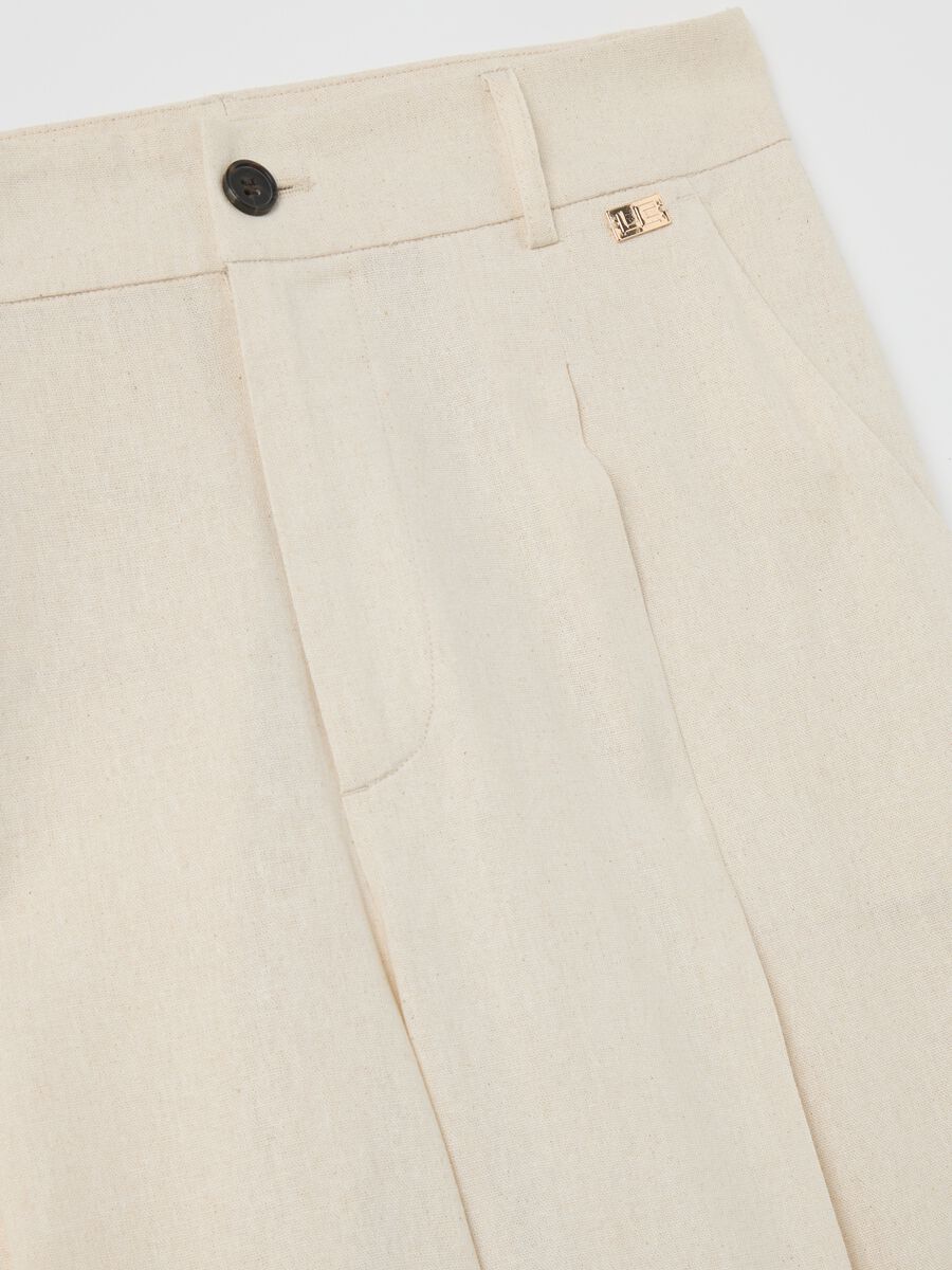 Pantalone chino a gamba larga avorio_1