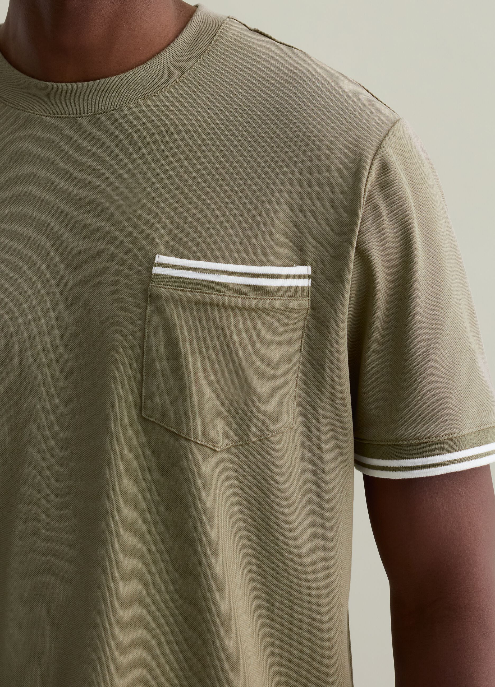 T-shirt with striped details and pocket