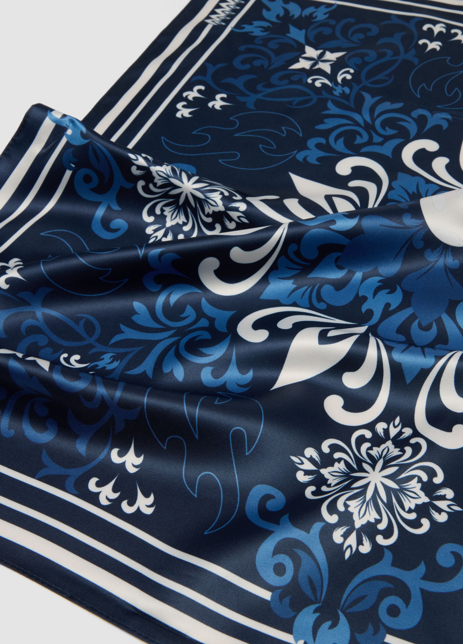 Blue scarf with ornamental print