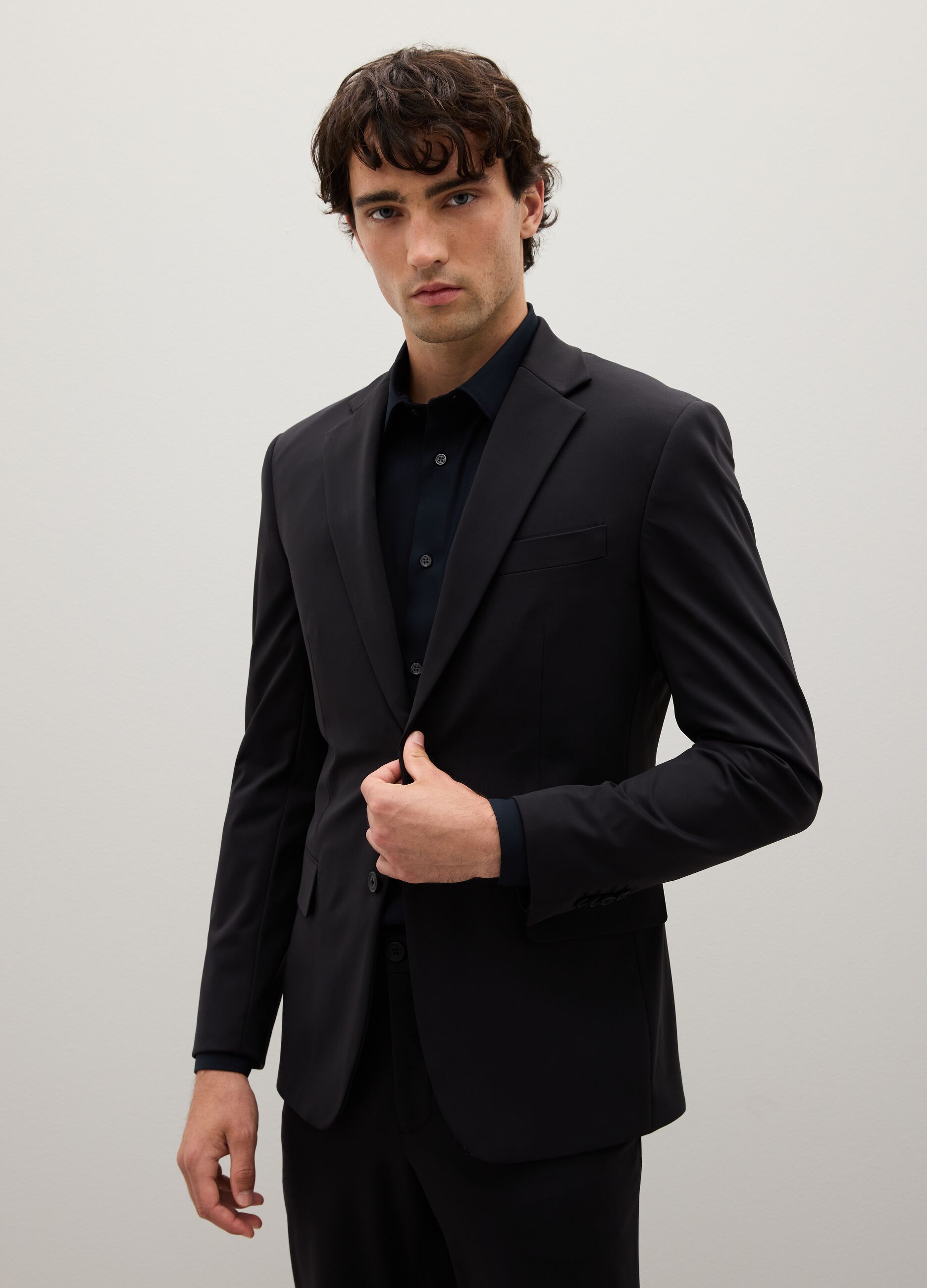Blazer in tessuto elasticizzato nero slim fit