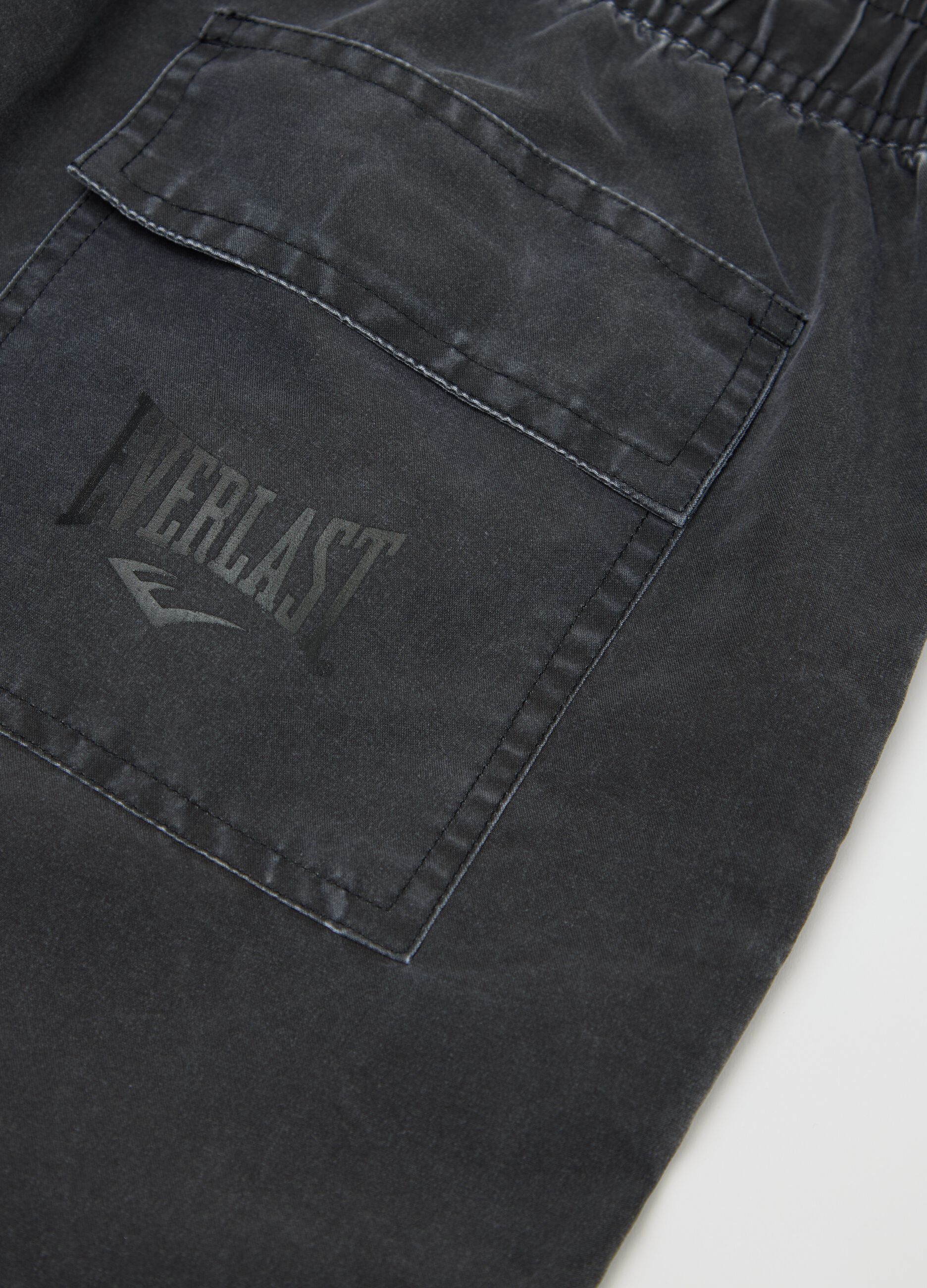 Grey swimming trunks with logo print