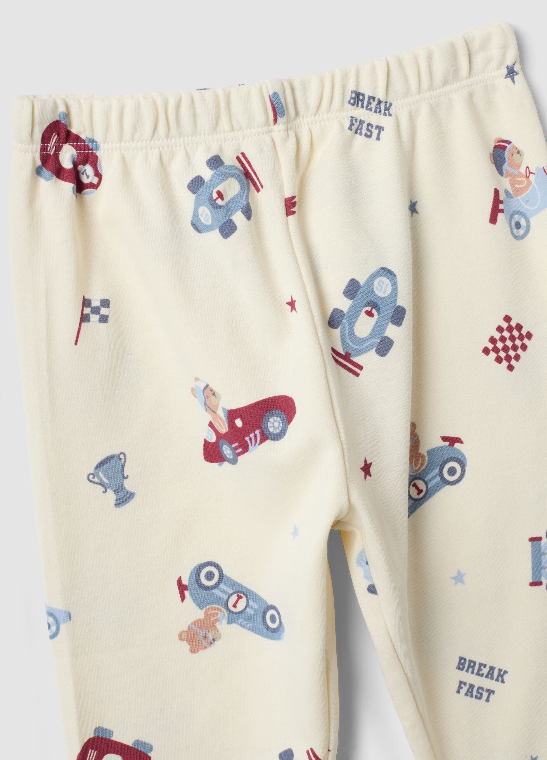 White organic cotton baby pyjamas with car print