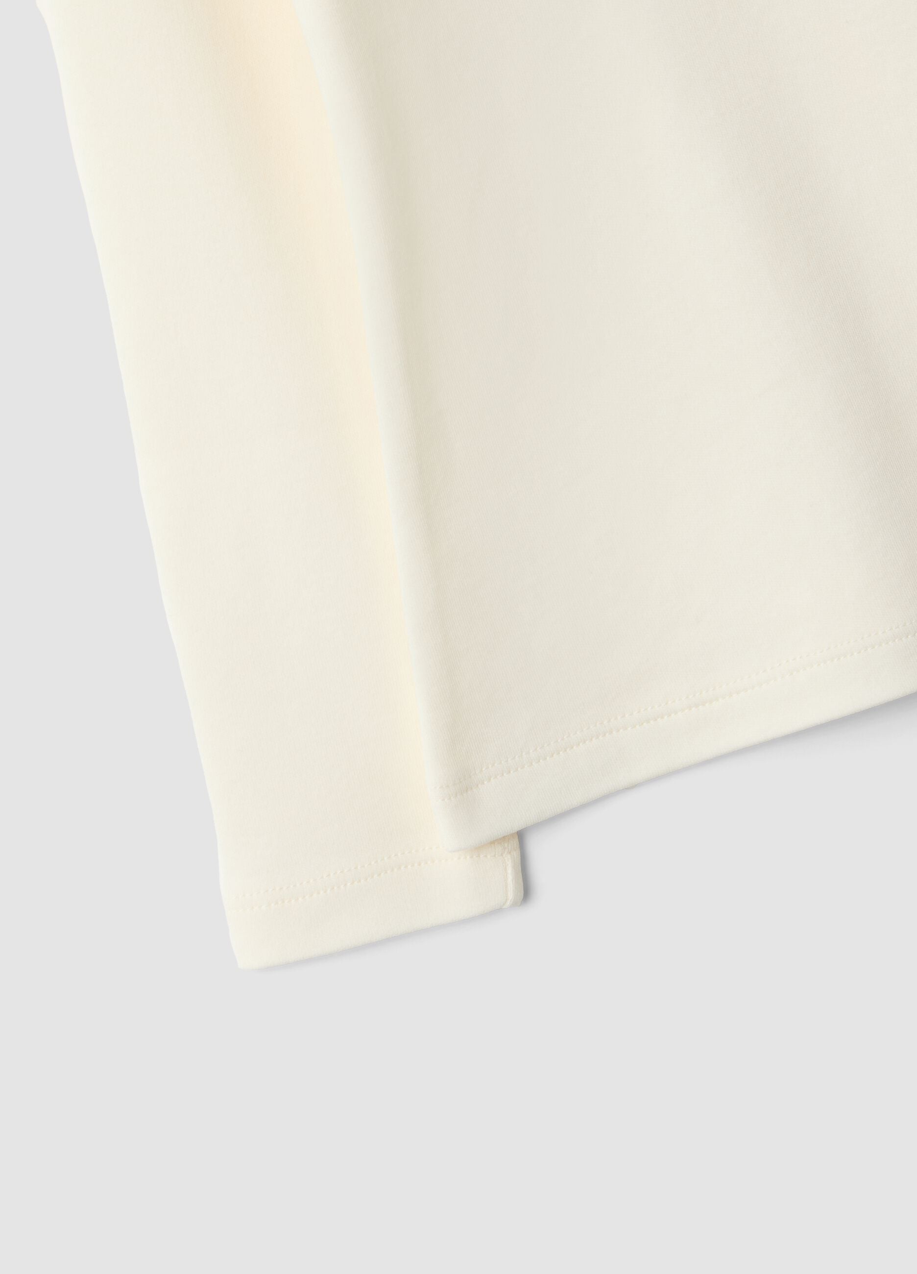 White pure organic cotton T-shirt with mock neck and animal print