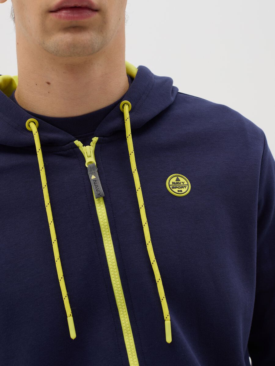Blue full-zip sweatshirt with hood and yellow details_2