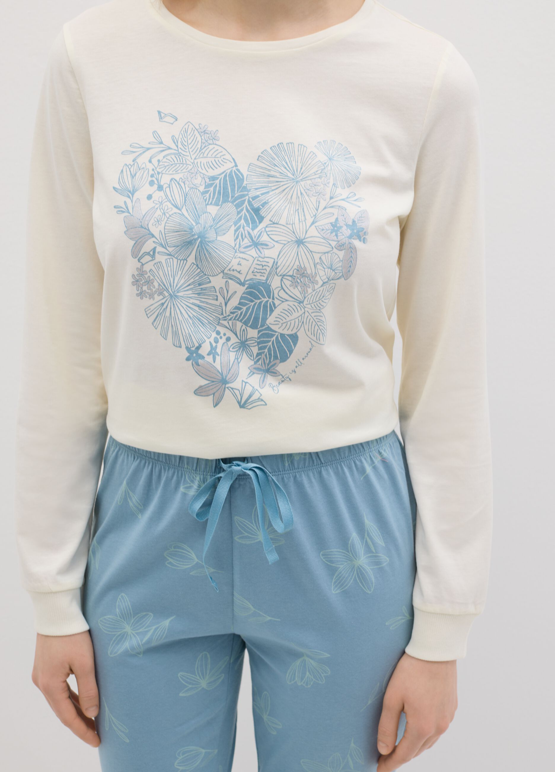 White and light blue cotton pyjamas with floral print