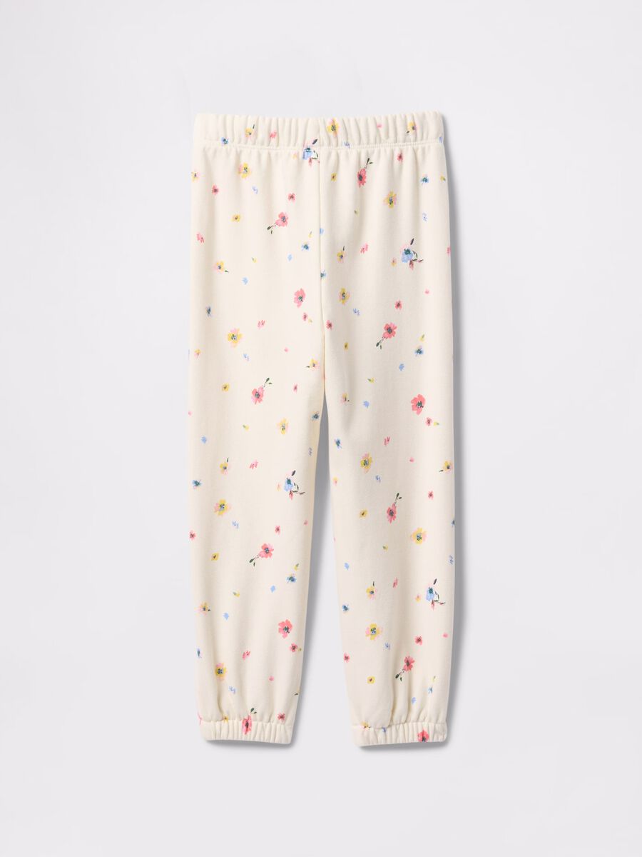 Joggers bianchi con coulisse stampa fiori e ricamo logo_1
