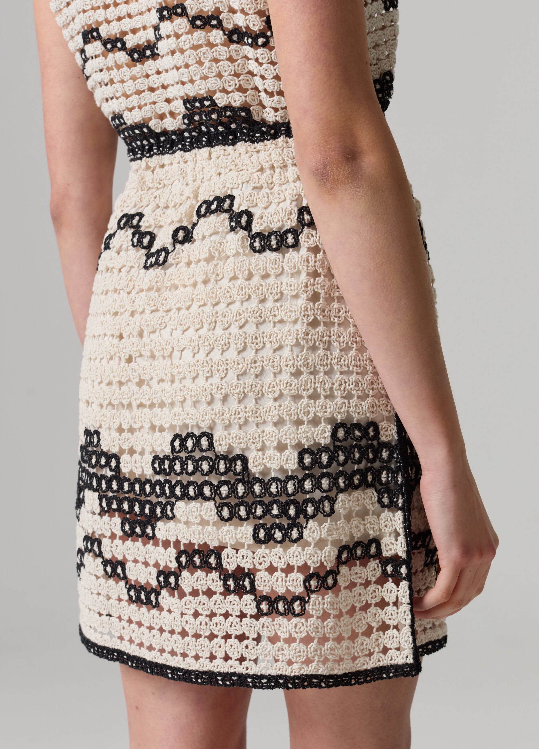 Crochet miniskirt with wavy motif