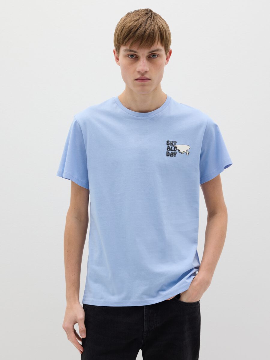 Light blue T-shirt with skateboards print_0
