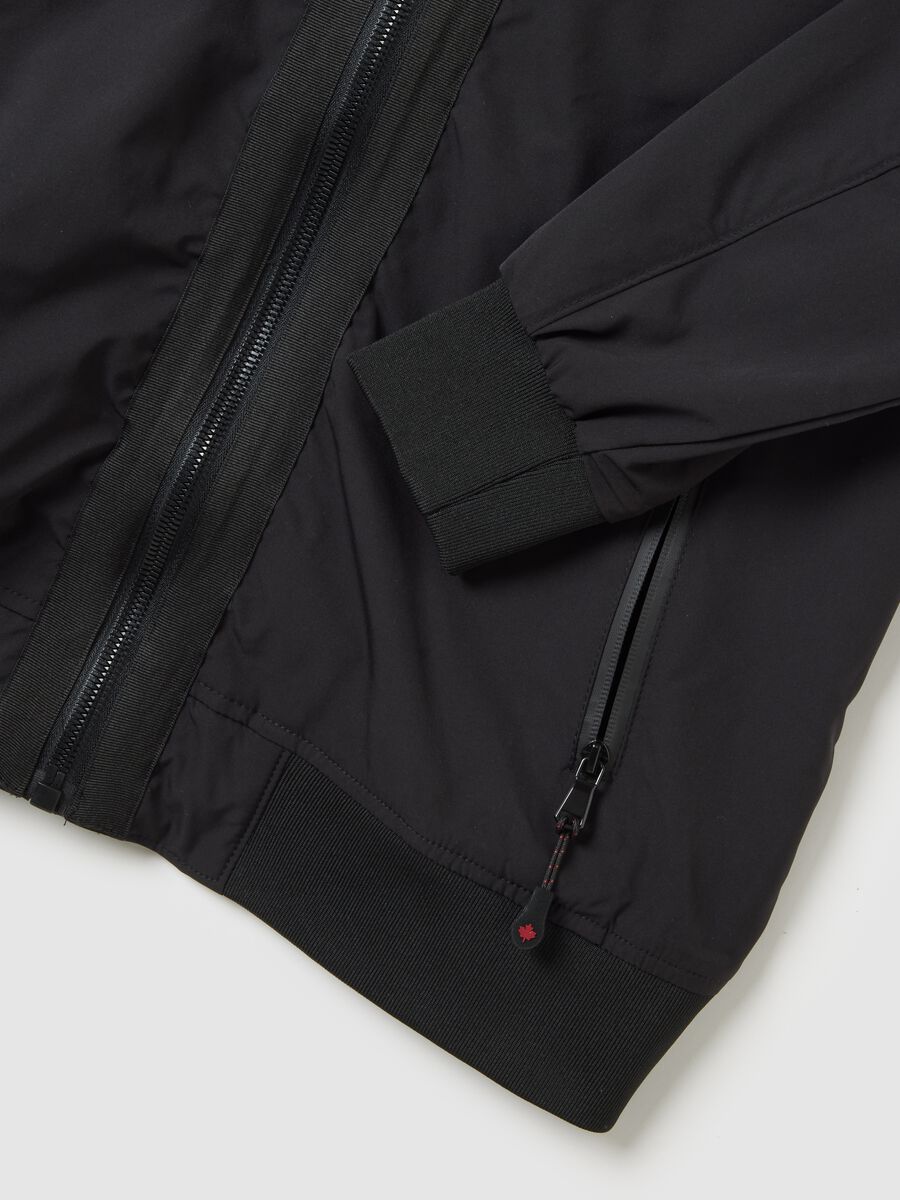 Black jacket in heavy fabric with hood and zip_5
