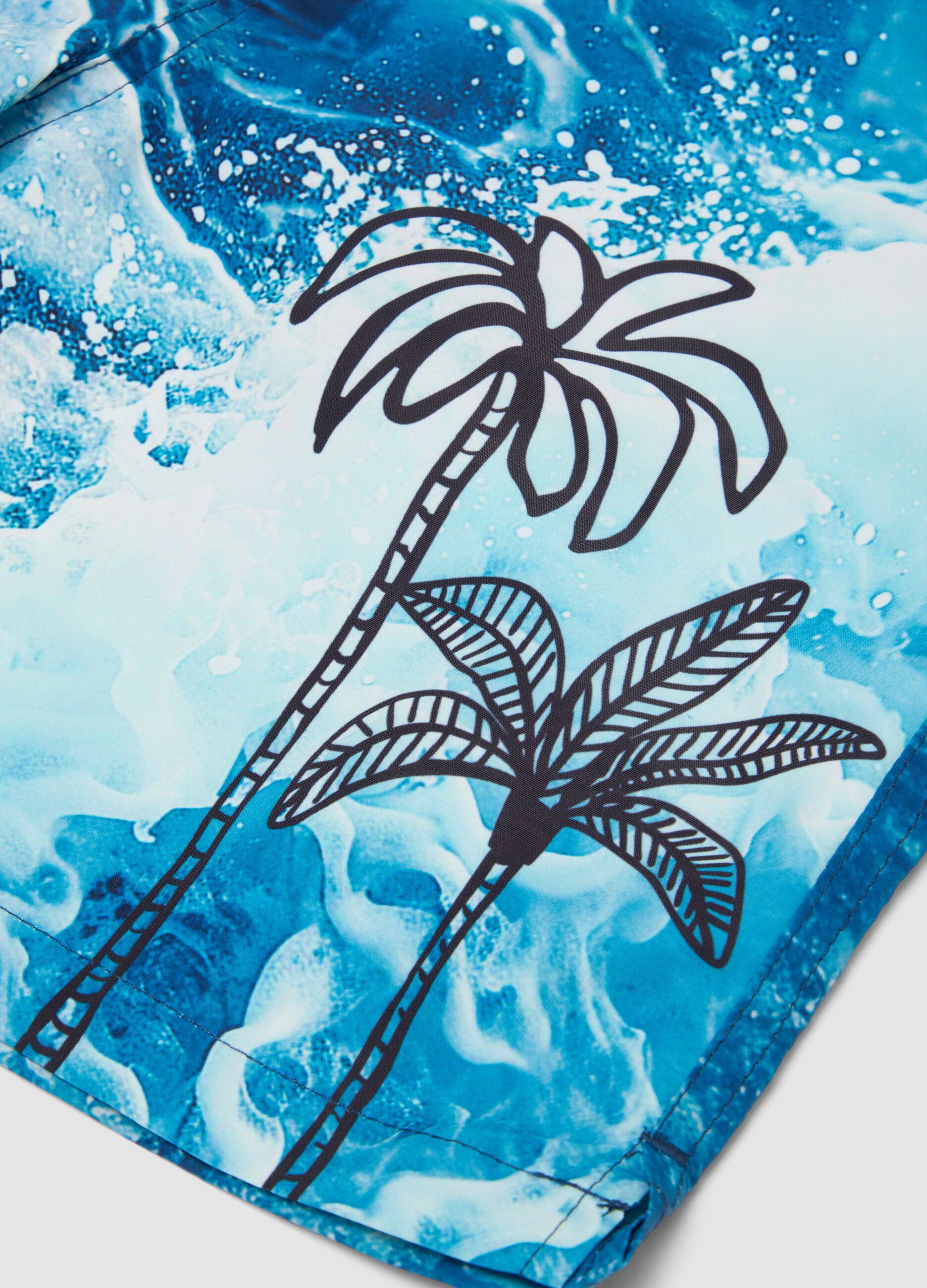 Blue boys&rsquo; swim shorts with wave and palm print