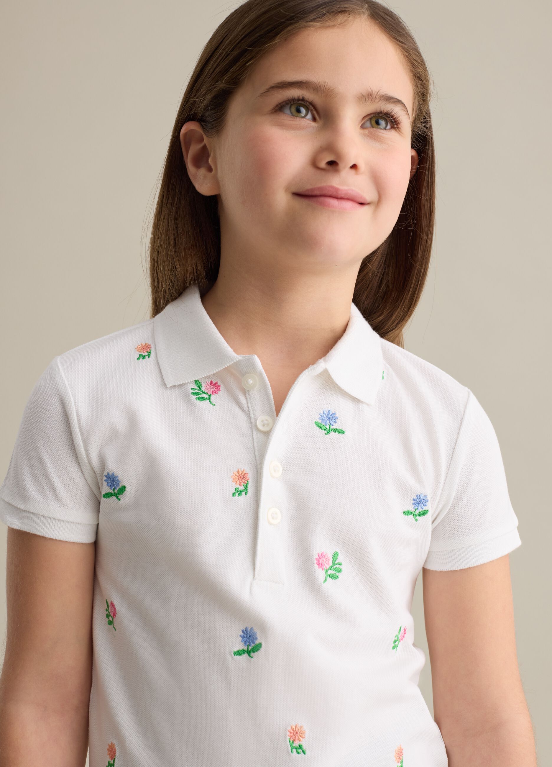 Cotton polo shirt with embroidered flowers