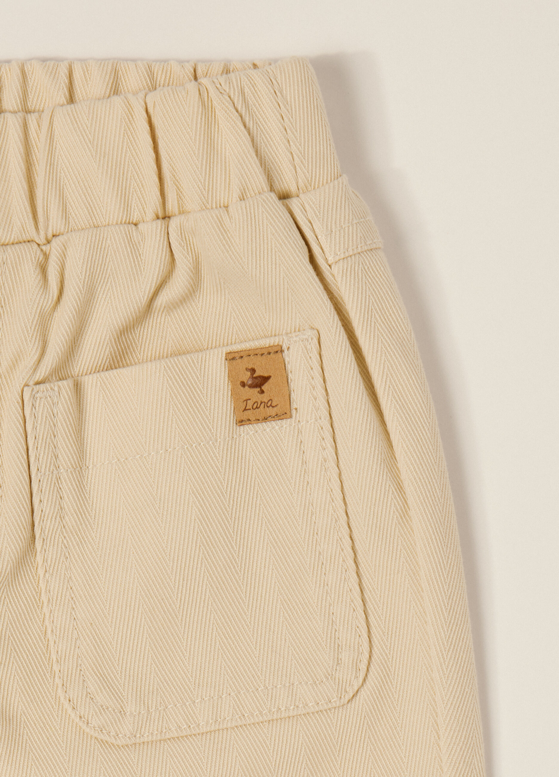 Beige stretchy trousers for newborn