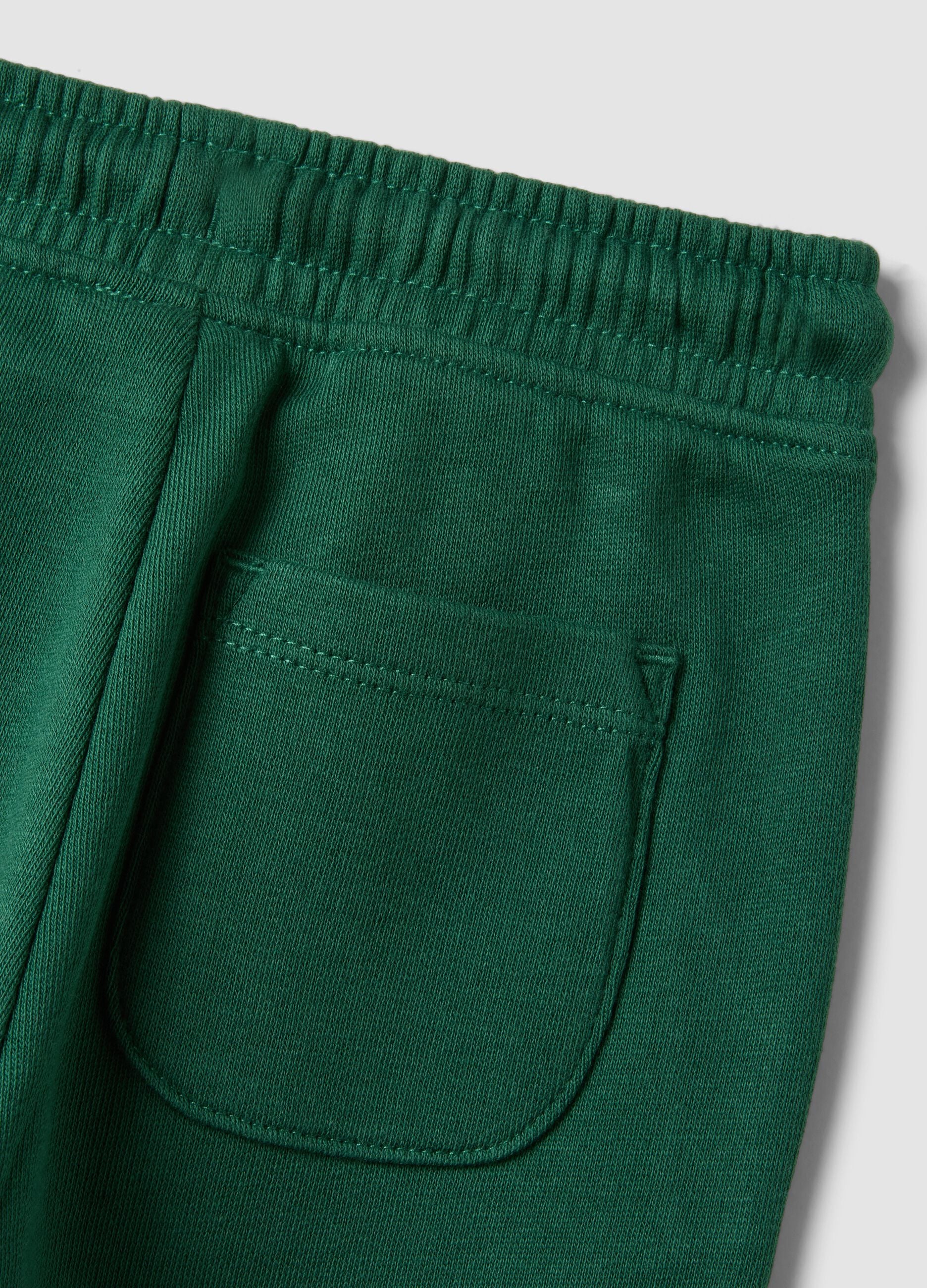 Pantaloni jogger verdi in puro cotone organico con coulisse per bimbo