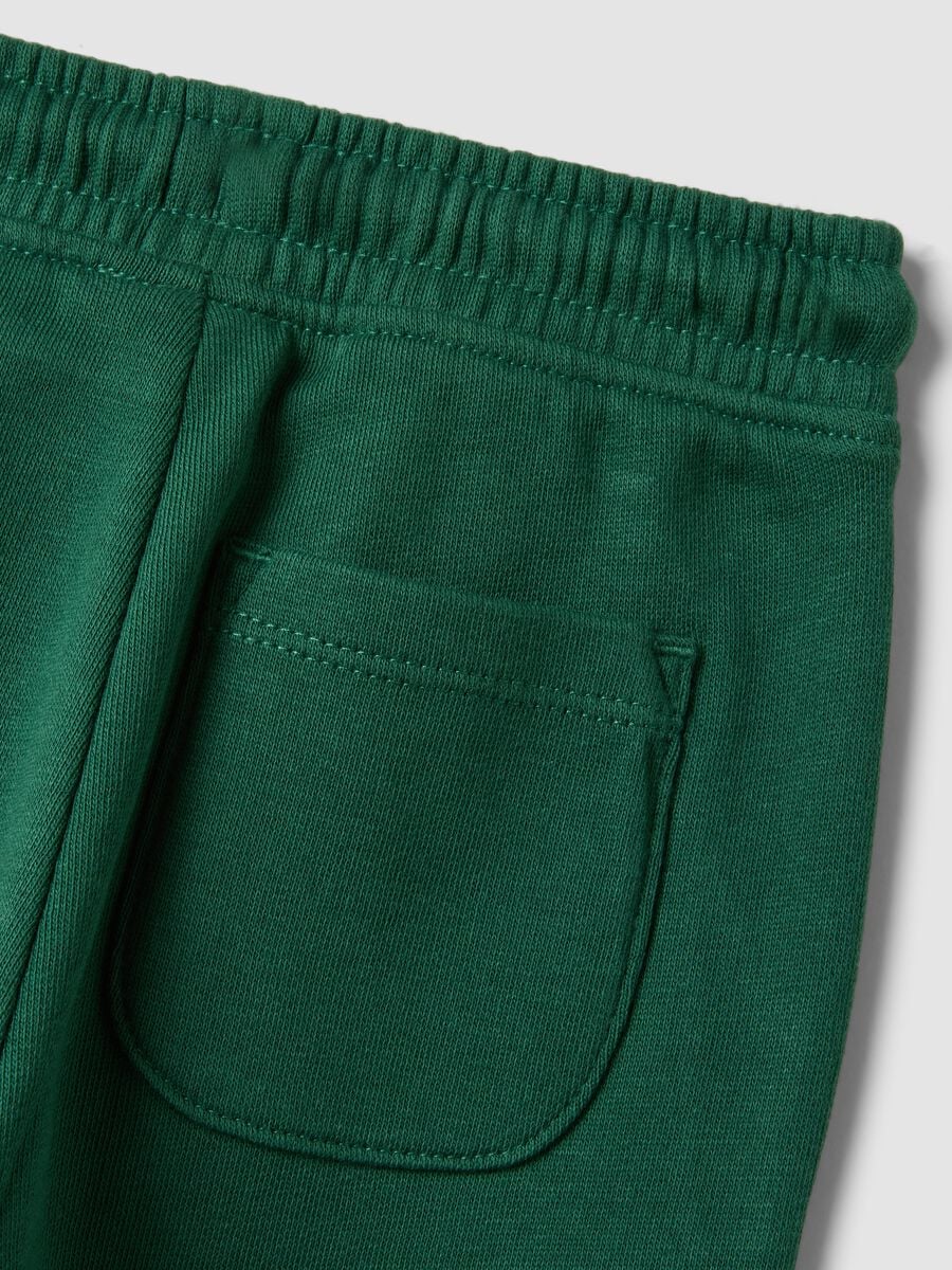 Pantaloni jogger verdi in puro cotone organico con coulisse per bimbo_3