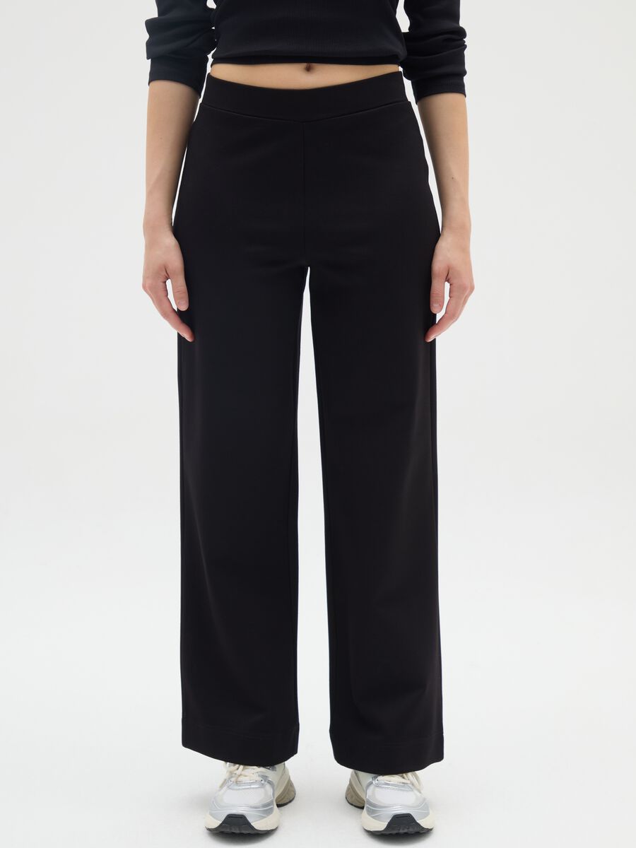 Pantaloni neri a gamba larga elasticizzati_1