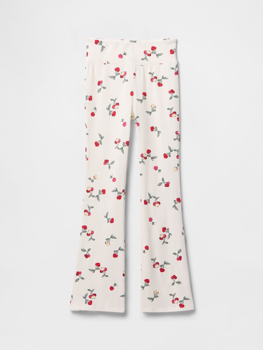 Flared trousers with floral pattern on white background_3