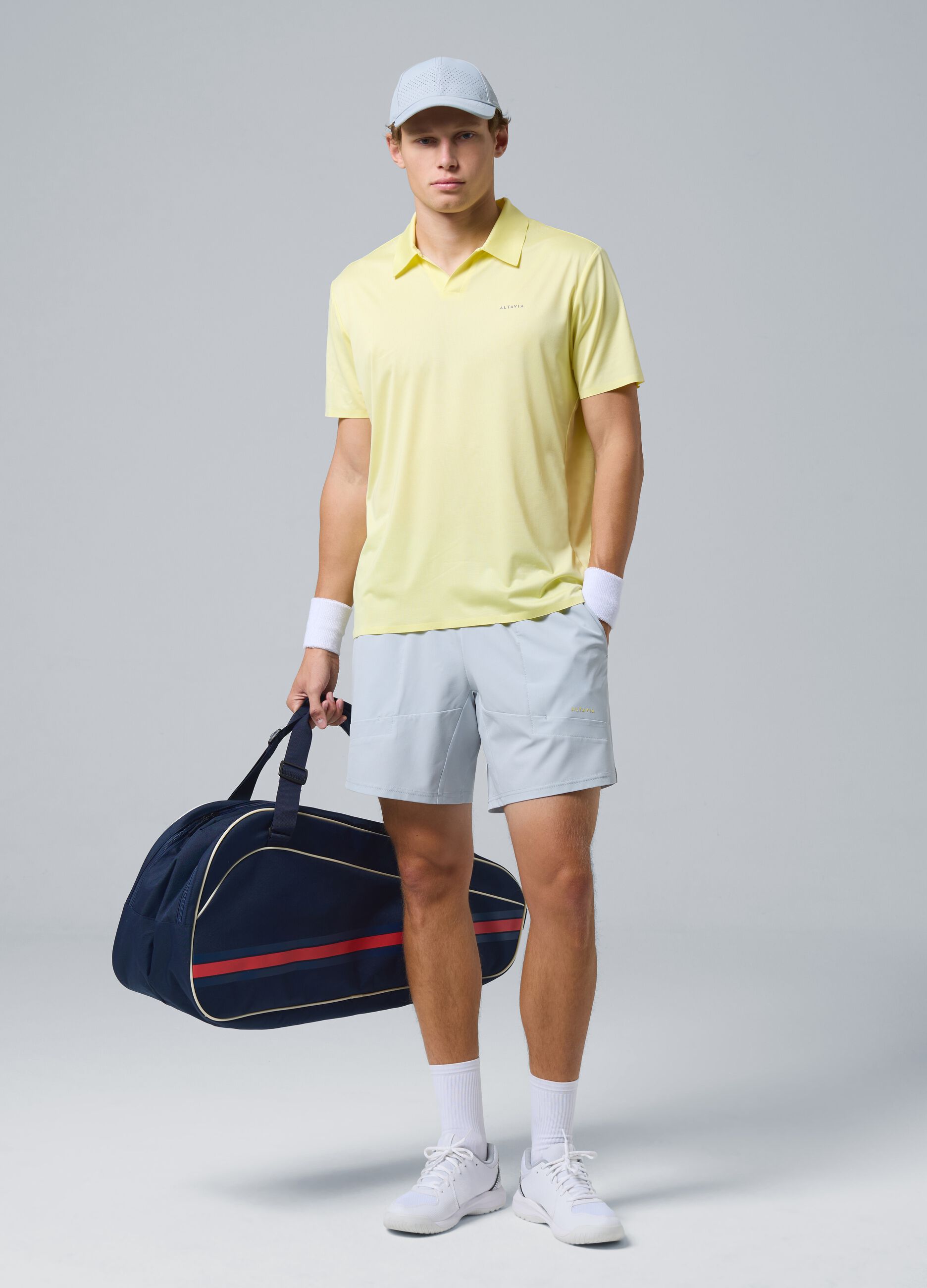 Yellow ALTAVIA COURT stretch performance polo