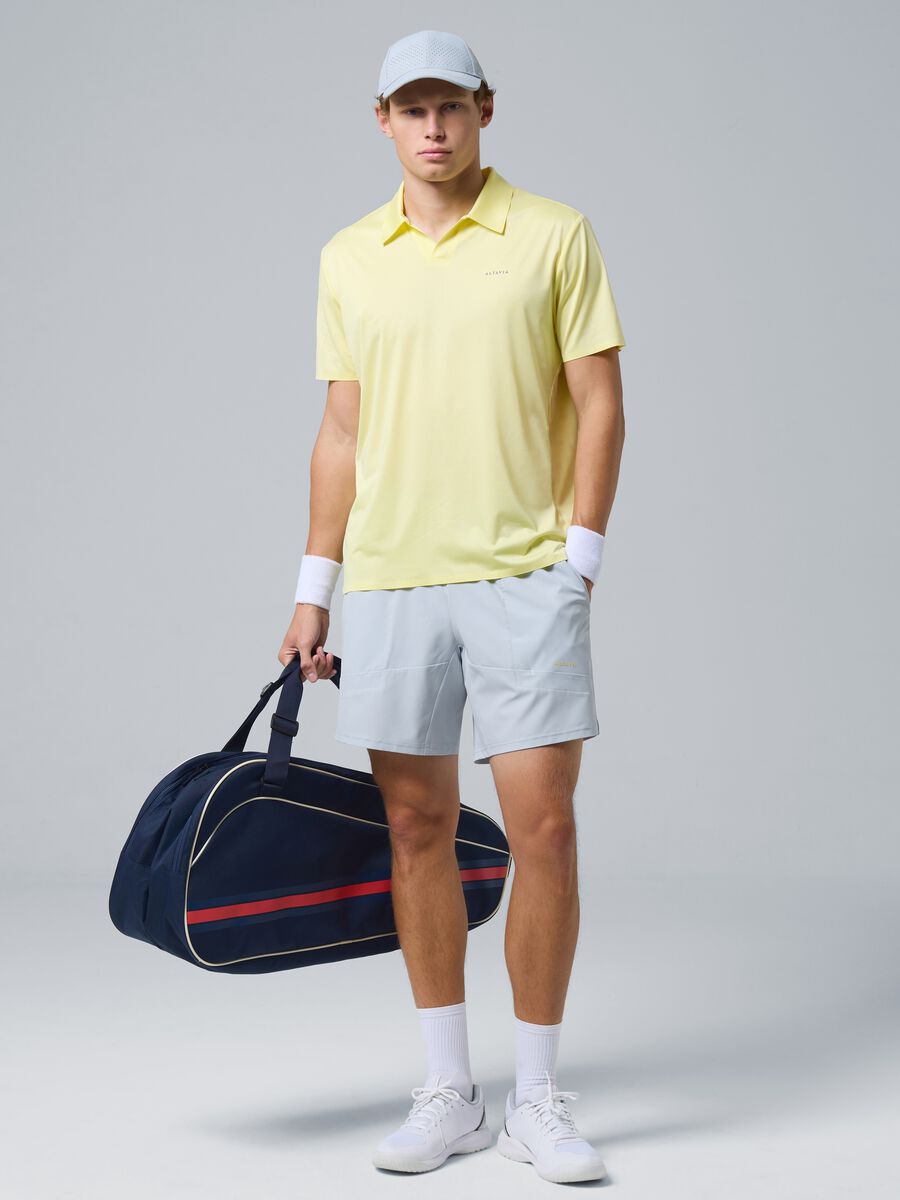 Polo sportiva gialla in tessuto elasticizzato ALTAVIA COURT_1