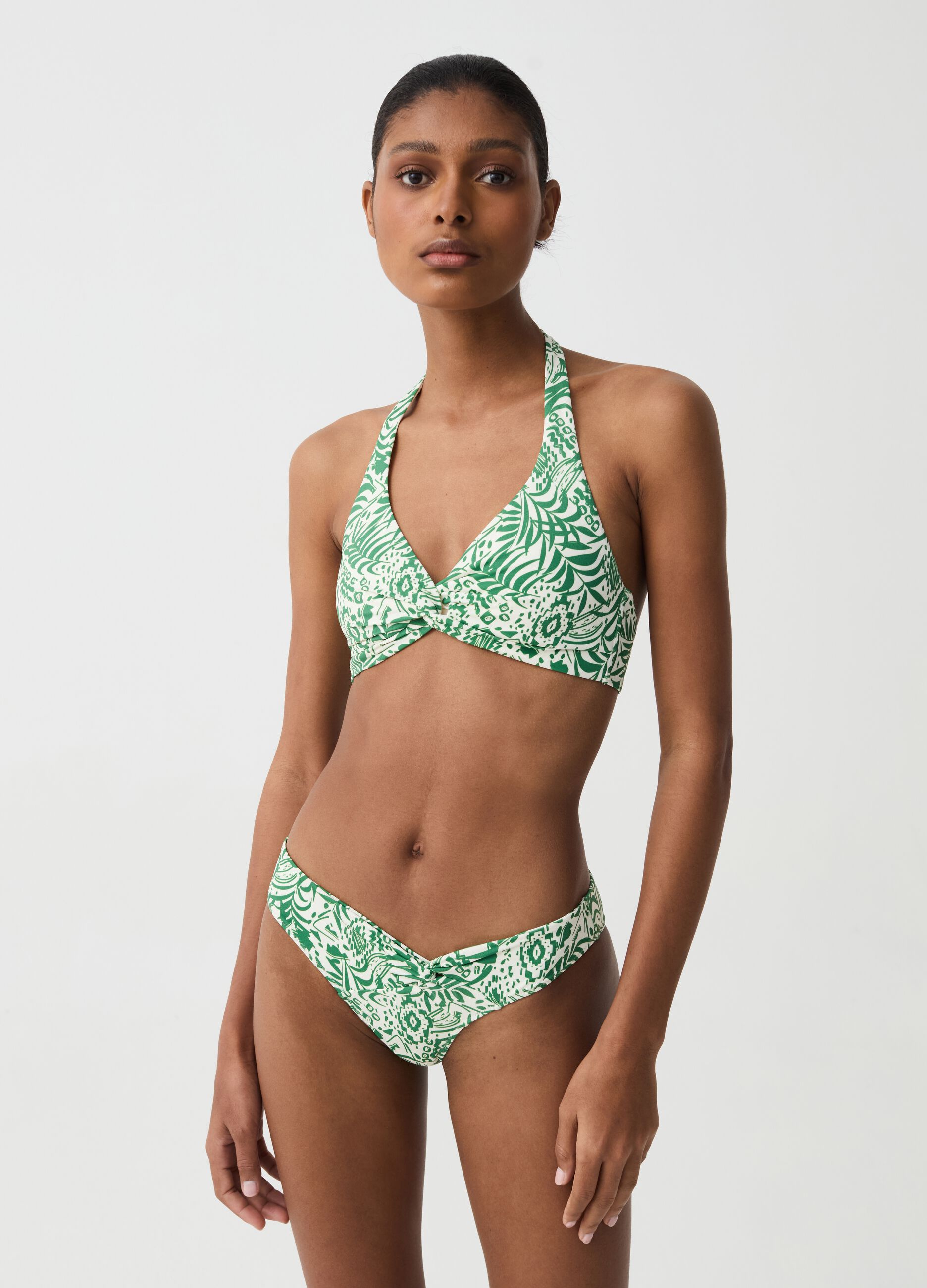 Bikini top with halter neck and foliage print