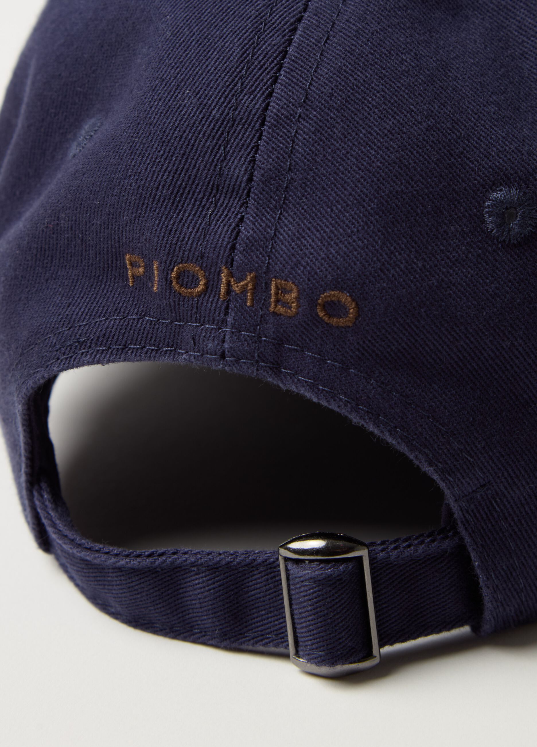 Baseball cap with embroidered logo