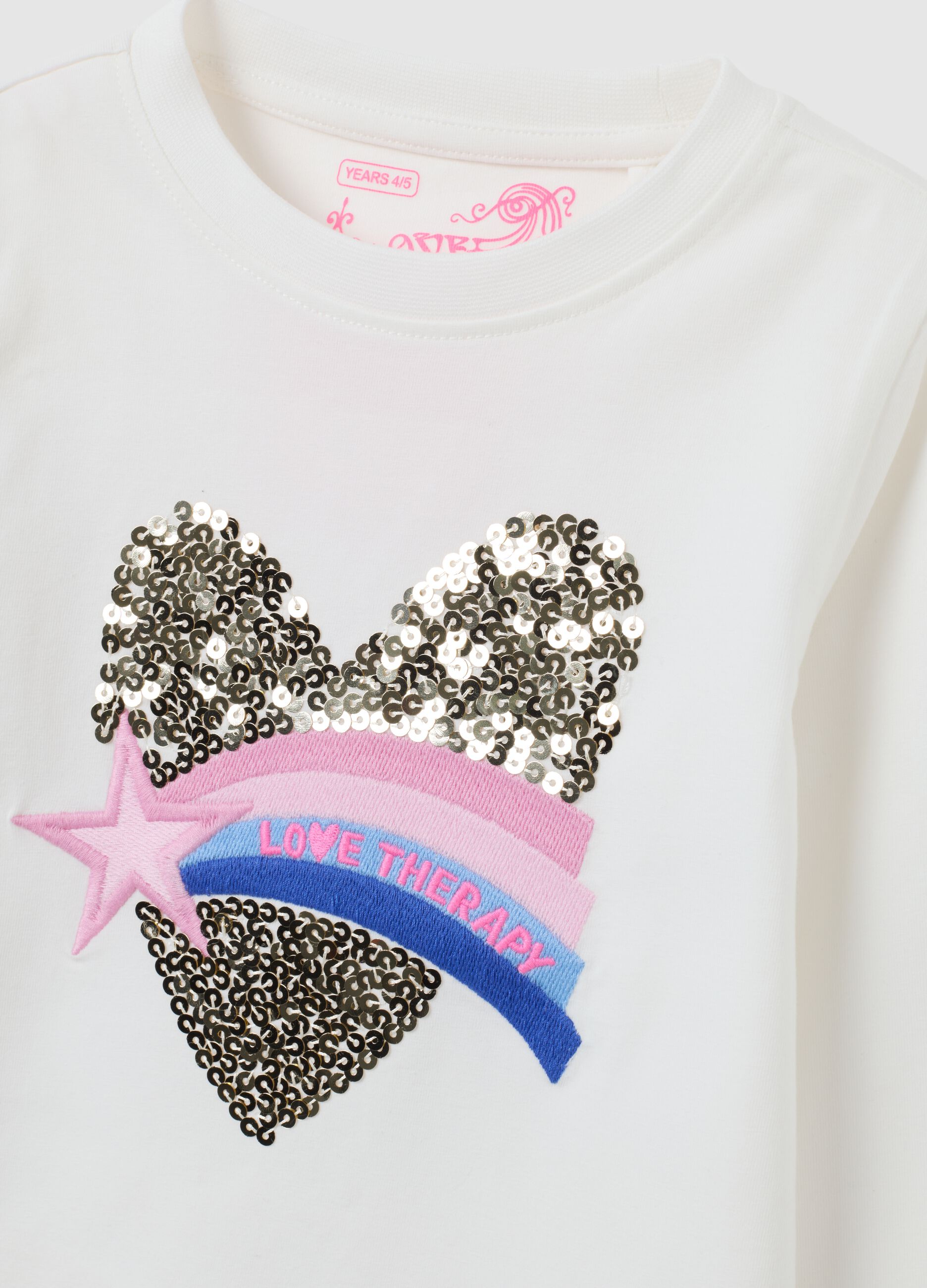 White girl's T-shirt with heart-shaped sequins