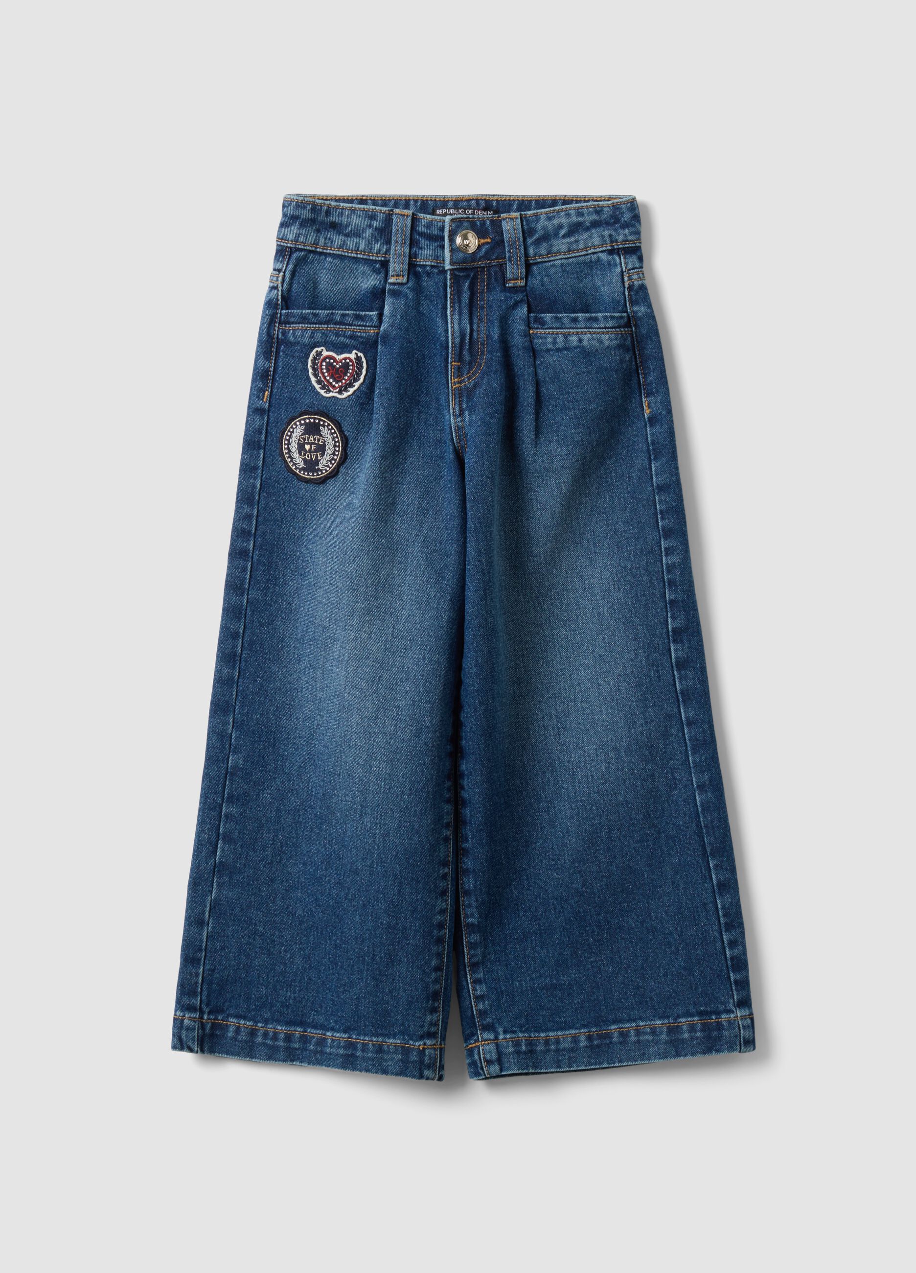 Jeans blu wide leg in puro cotone con patch per bambina