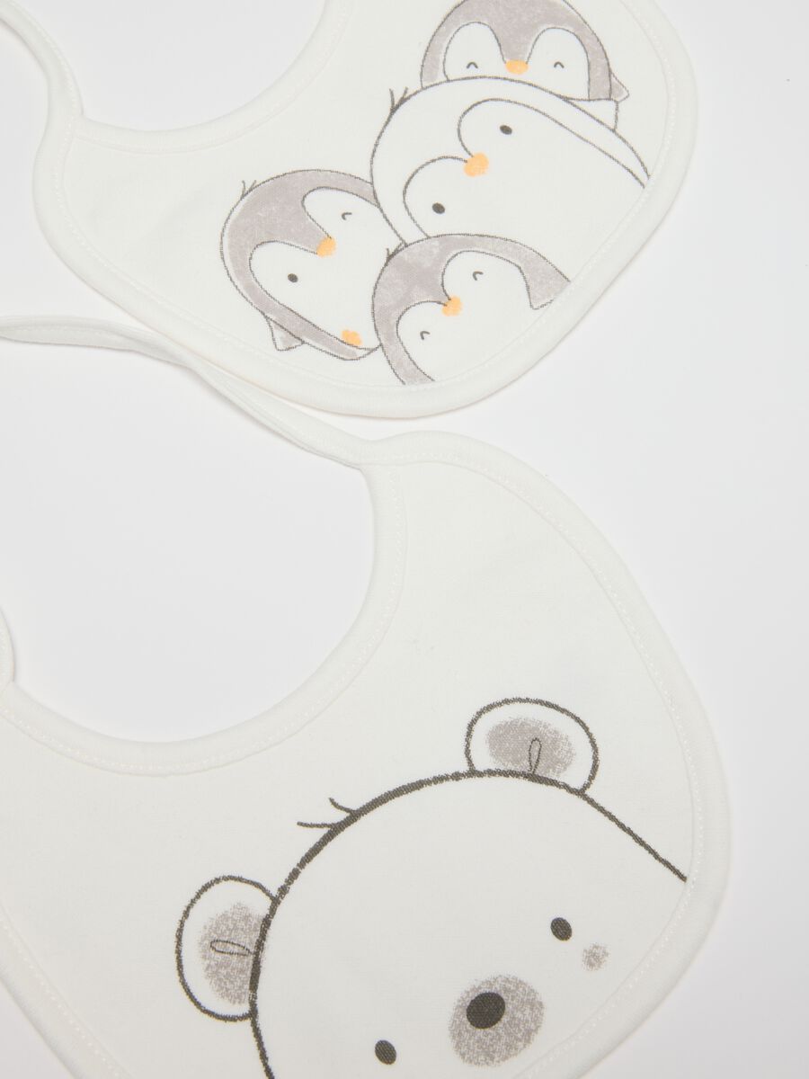 Twin pack of white cotton bibs with animal prints_2
