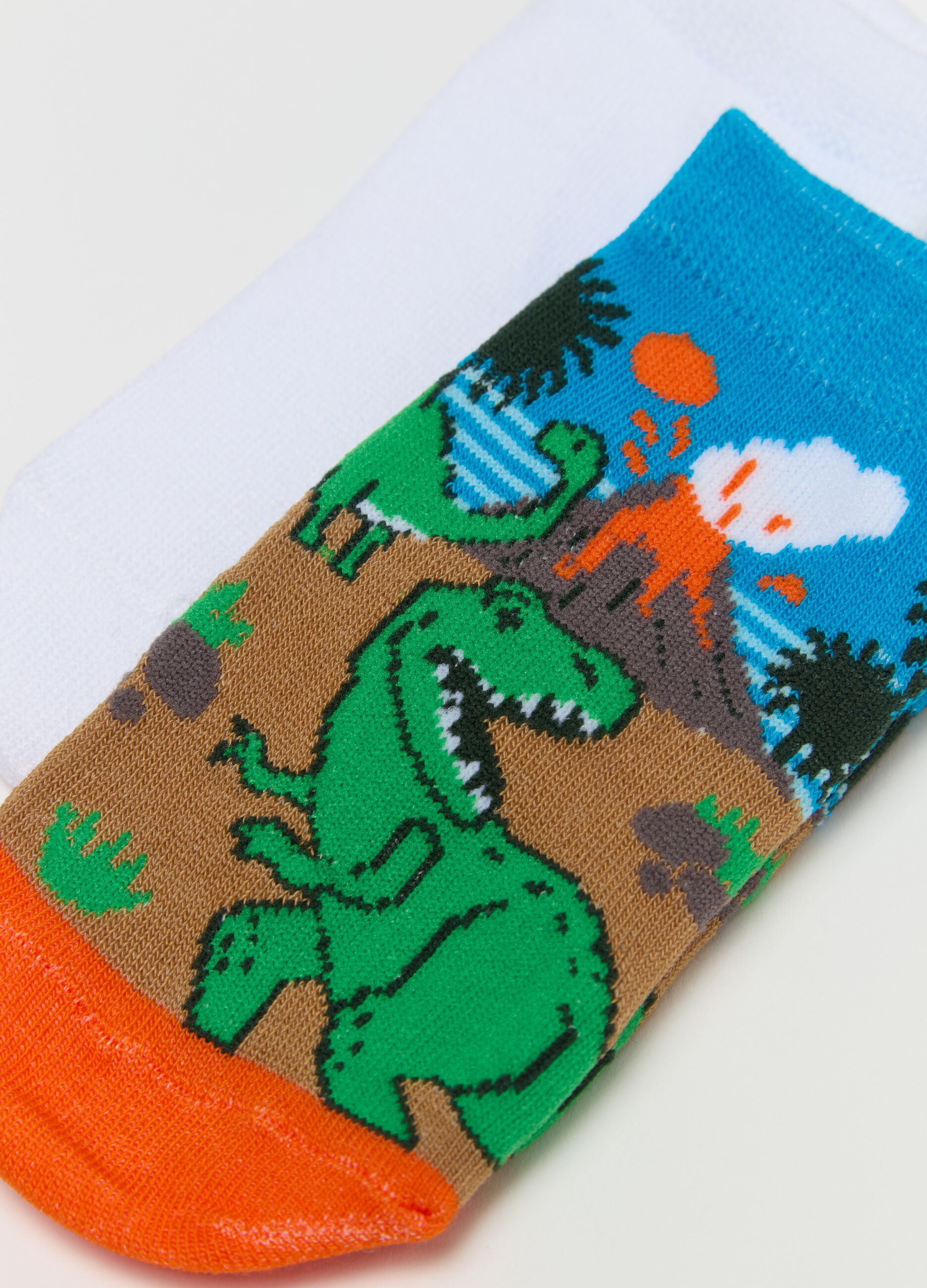Three-pair pack socks with stripes and dinosaurs design