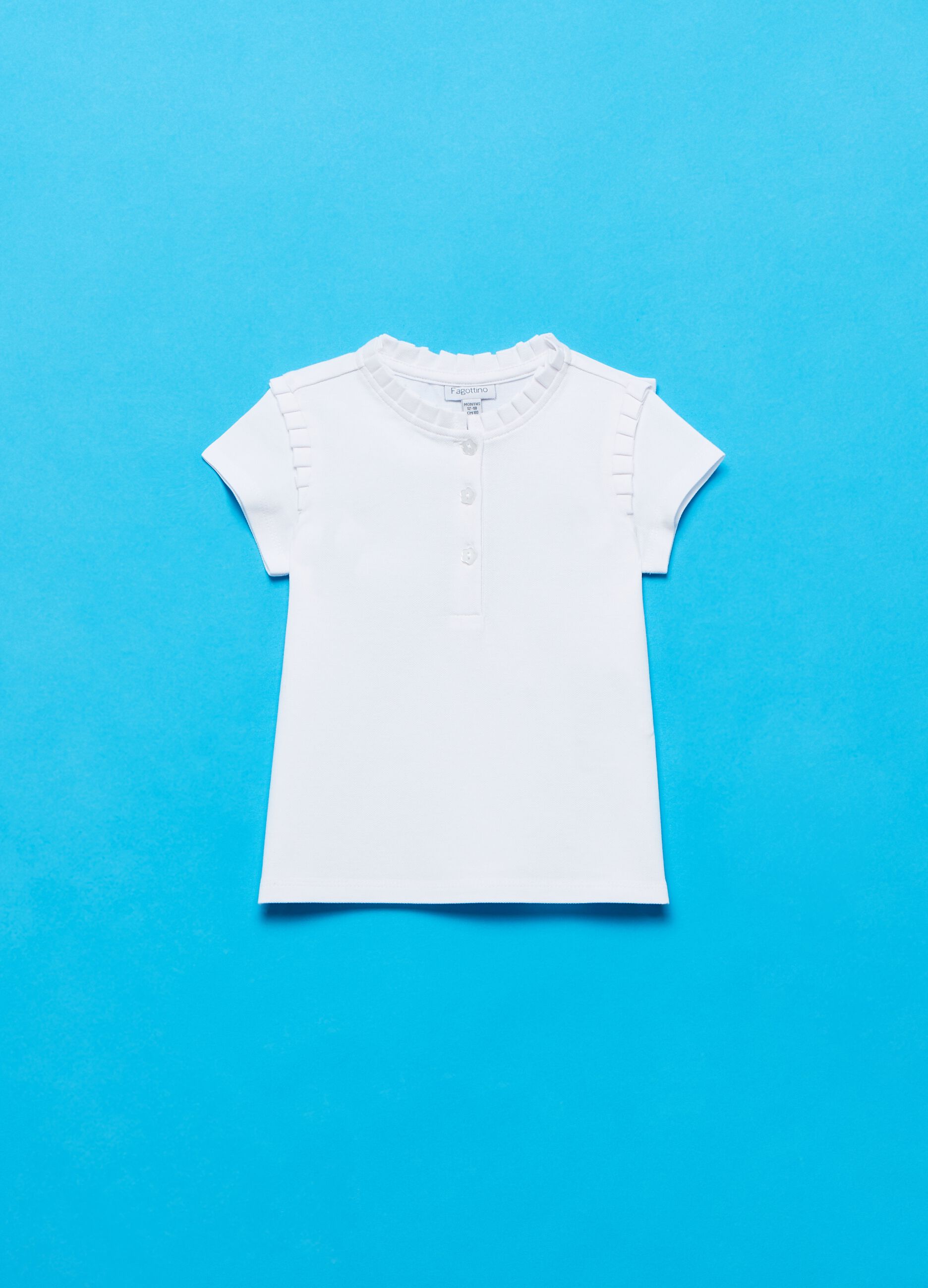 Polo shirt with frills and flower buttons